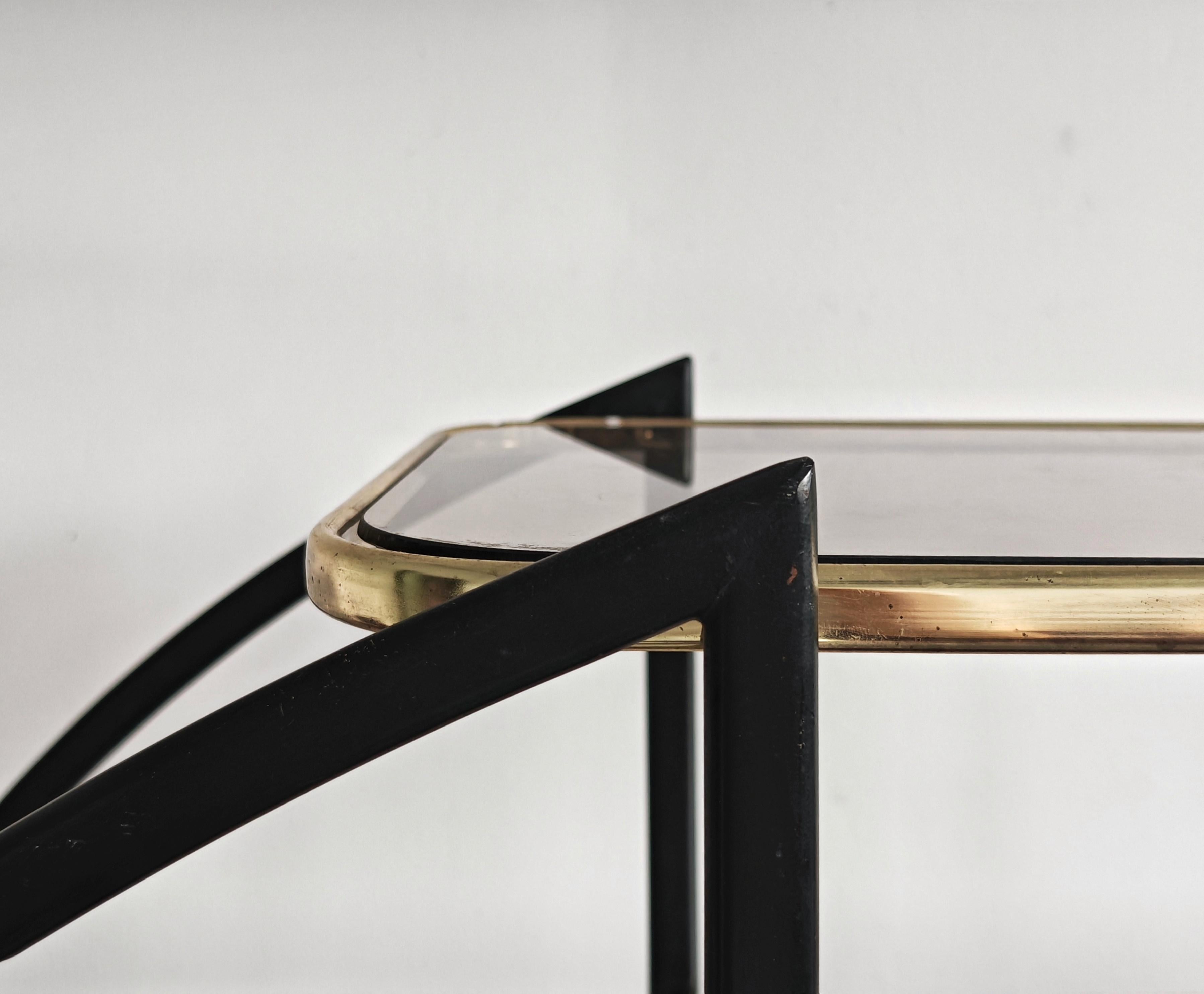 Grande scaffale divisorio rotondo Hollywood Regency in metallo nero e ottone in vendita 1