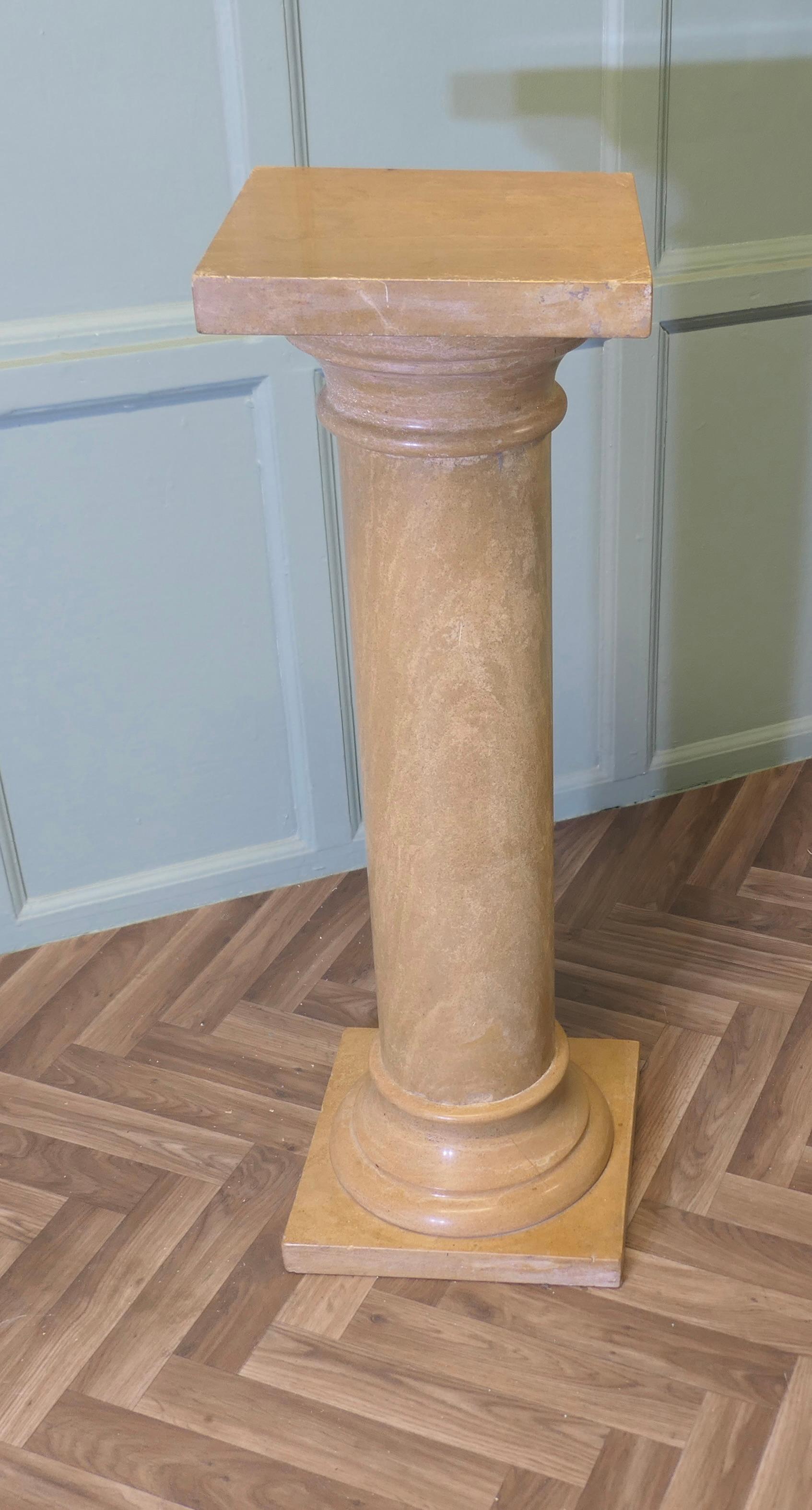 Large Honey Coloured Marble Column

This is a very heavy piece it is made in solid marble, the column comes into 3 for ease of transportation but never the less all the parts are heavy, it is set on a square stepped based and has a square top
This