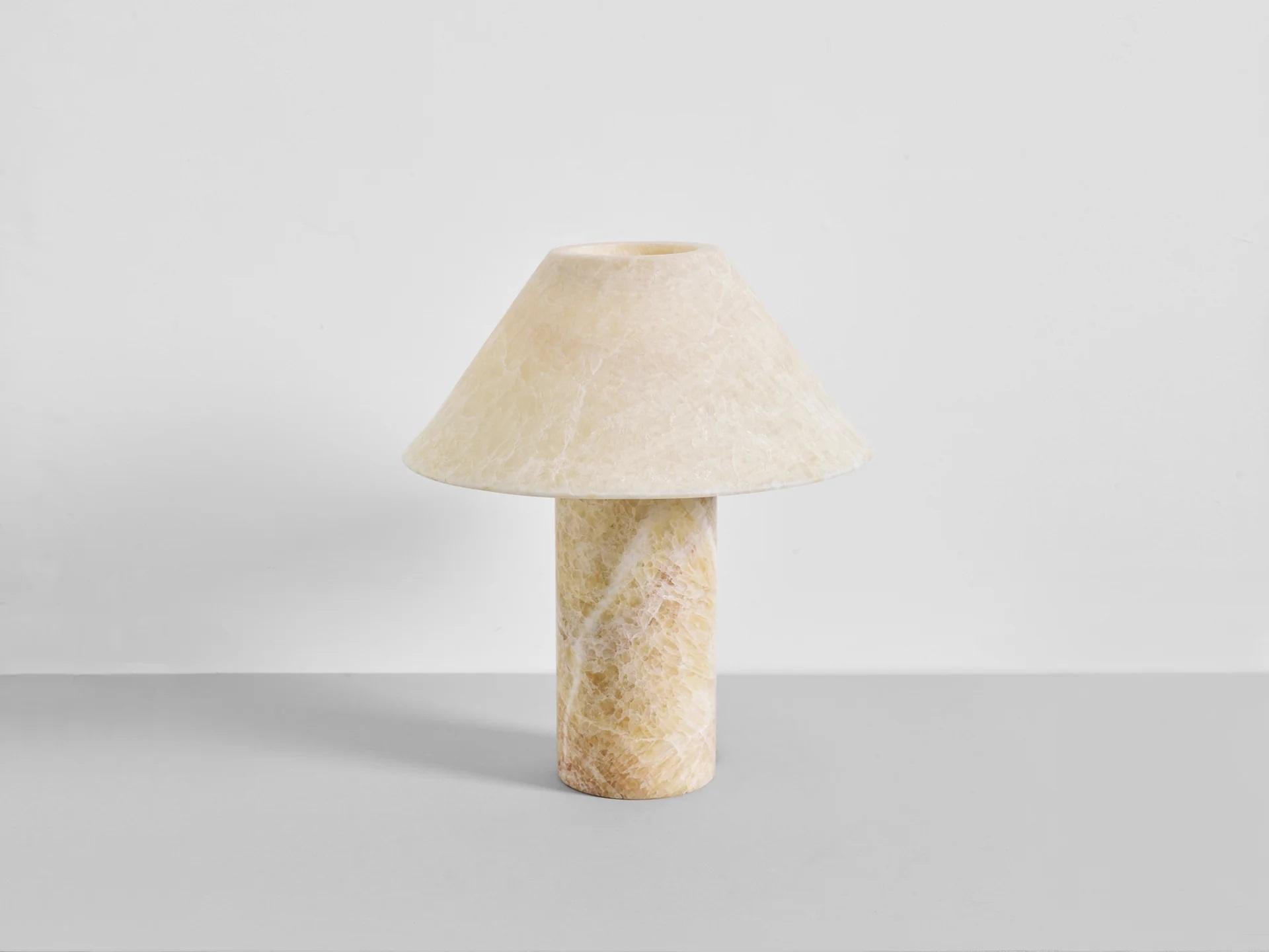 Large Honey Onyx Pillar Lamp by Henry Wilson
Dimensions: D 35 x H 40 cm
Materials: Honey Onyx.

The Pillar Lamp is designed to provide a warm, atmospheric glow – both from the light cast beneath its shade and illumination of the stone from within,