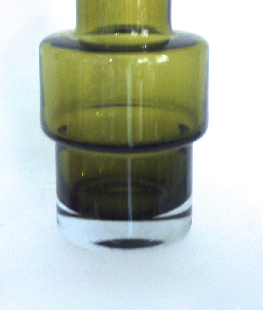 Large hooped vase Tamara Aladin for Riihimaki (Finland) 

The Riihimaki factory started manufacturing windows and glass bottles from 1910. Riihimaki was renamed Riihimaen Lasi Oy in 1937. Helena Tynell joined Riihimaki in 1949, followed by Nanny