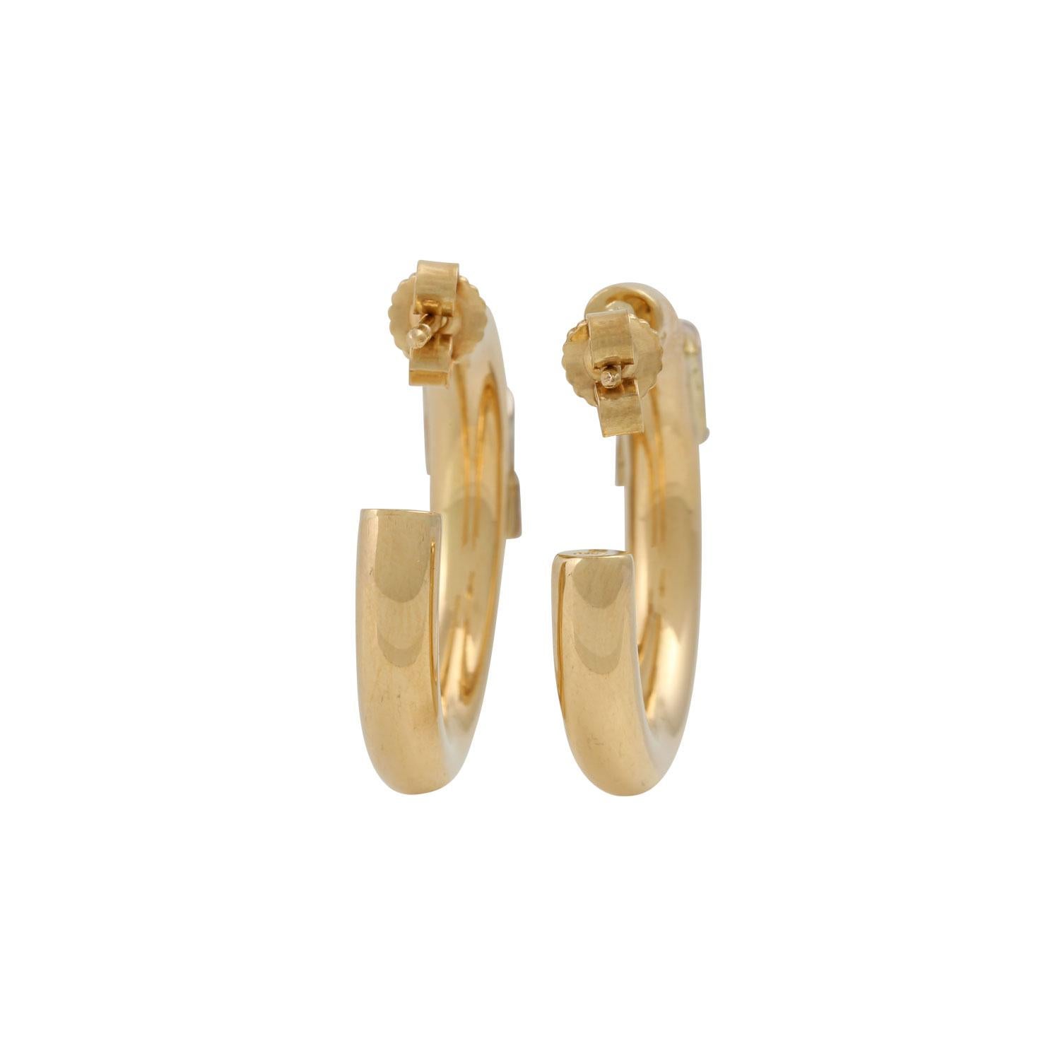 LARGE creoles with 8 brilliant-cut diamonds approx. 0.08 ct in total, good color and clarity, GG/WG 18K, 10.9 g, L: approx. 2.5 cm, W: approx. 5 mm, 20th century, slight signs of wear .

Hoop earrings with 8 brilliant-cut diamonds totaling approx.