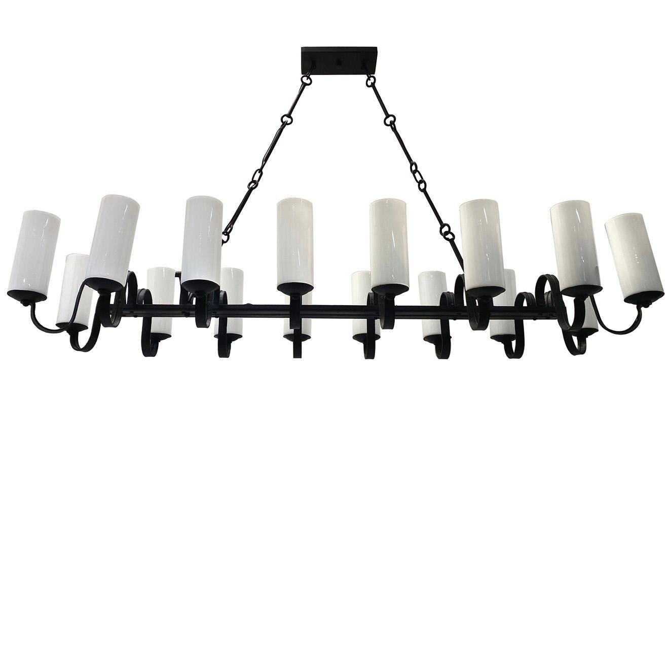 A circa 1920s Italian wrought iron chandelier with 16-light and milk glass shades.

Measurements:
Height 32.5