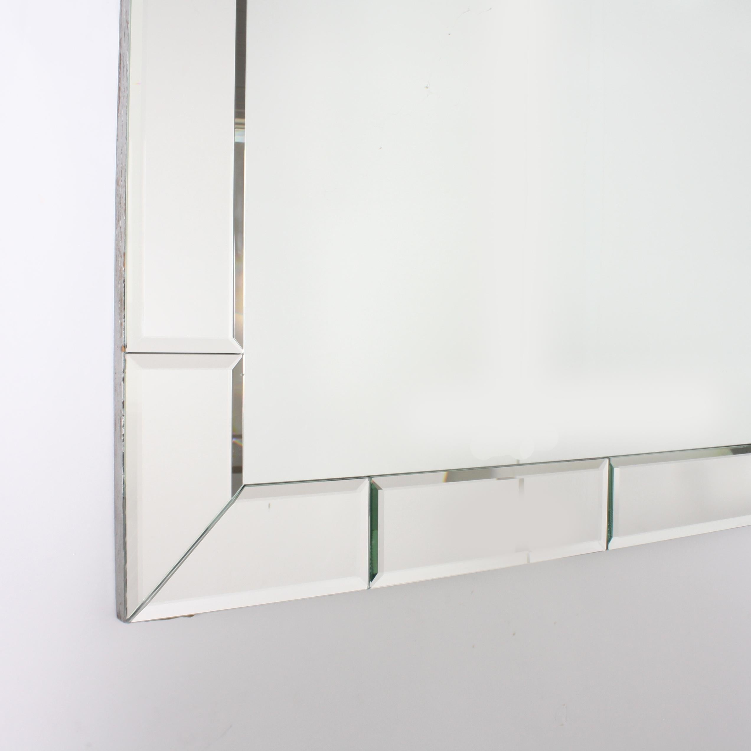 Large horizontal mirror frame mirror with mirror detail, circa 1940.
    