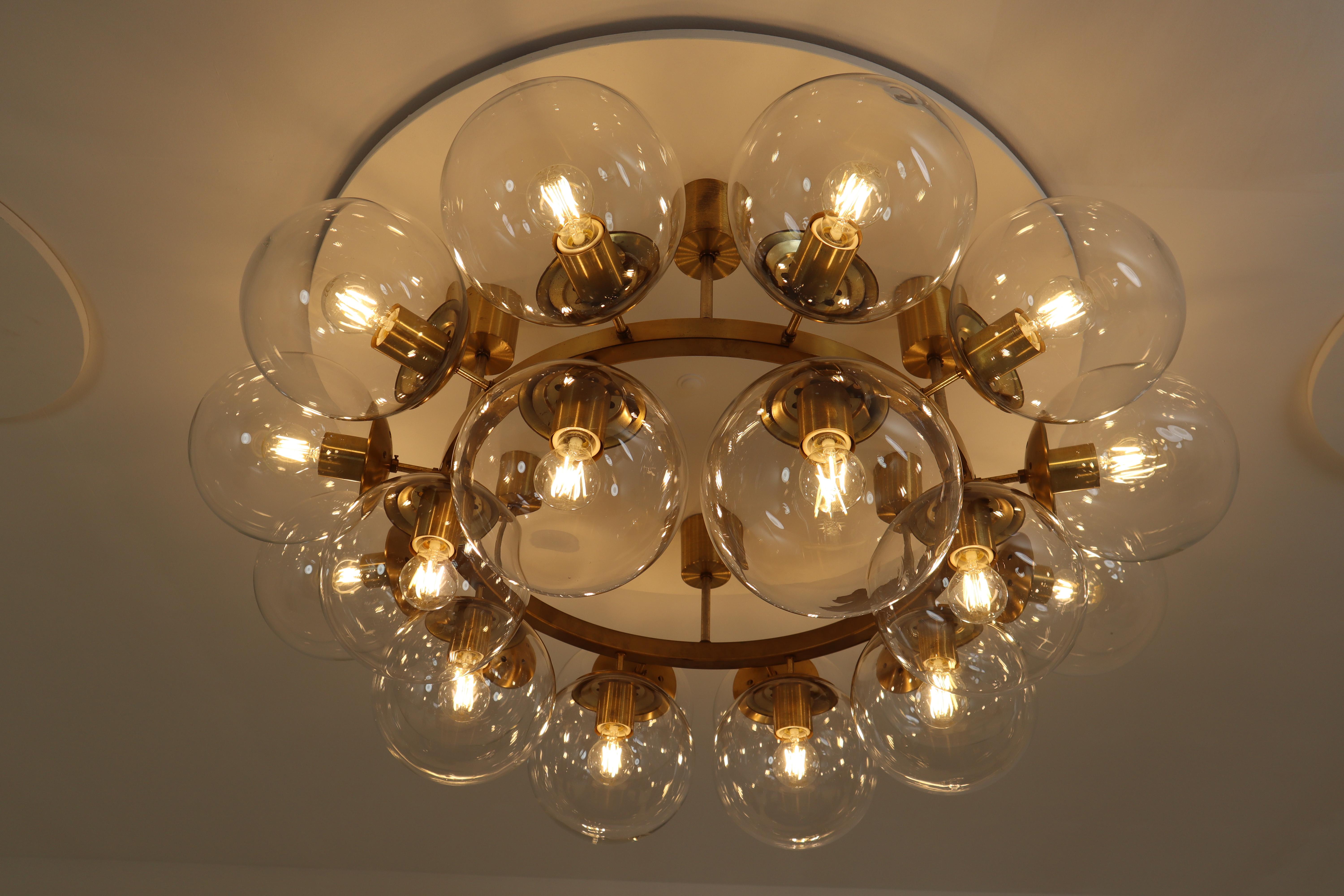 Mid-Century Modern Large Hotel Chandelier in Brass Fixture and 20 Large Hand-Blowed Glass Globes 