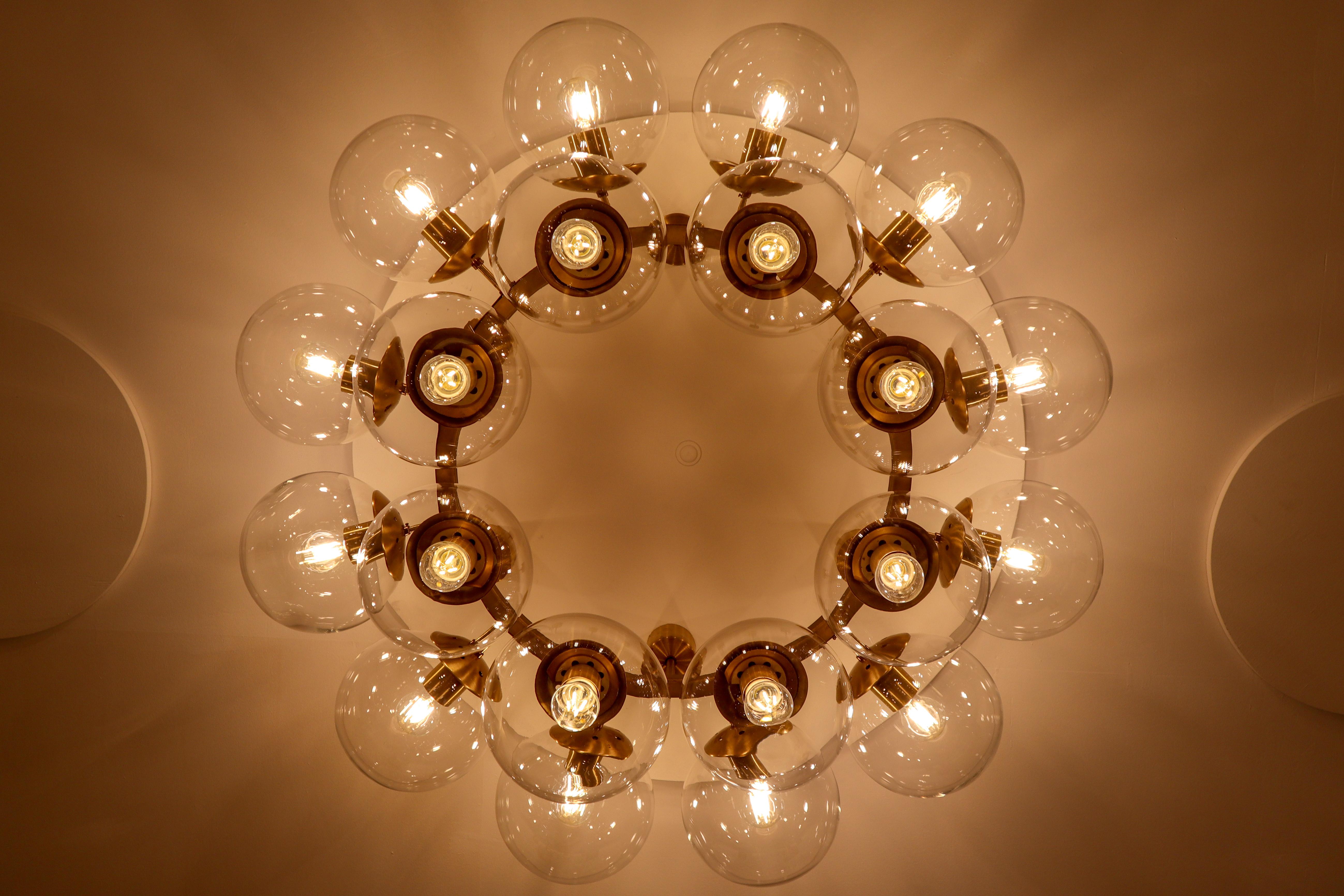 20th Century Large Hotel Chandelier in Brass Fixture and 20 Large Hand-Blowed Glass Globes 