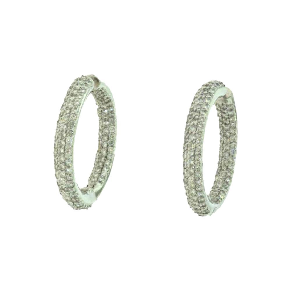 Große Huggie-Ohrringe aus Weißgold mit Scharnier und Diamanten