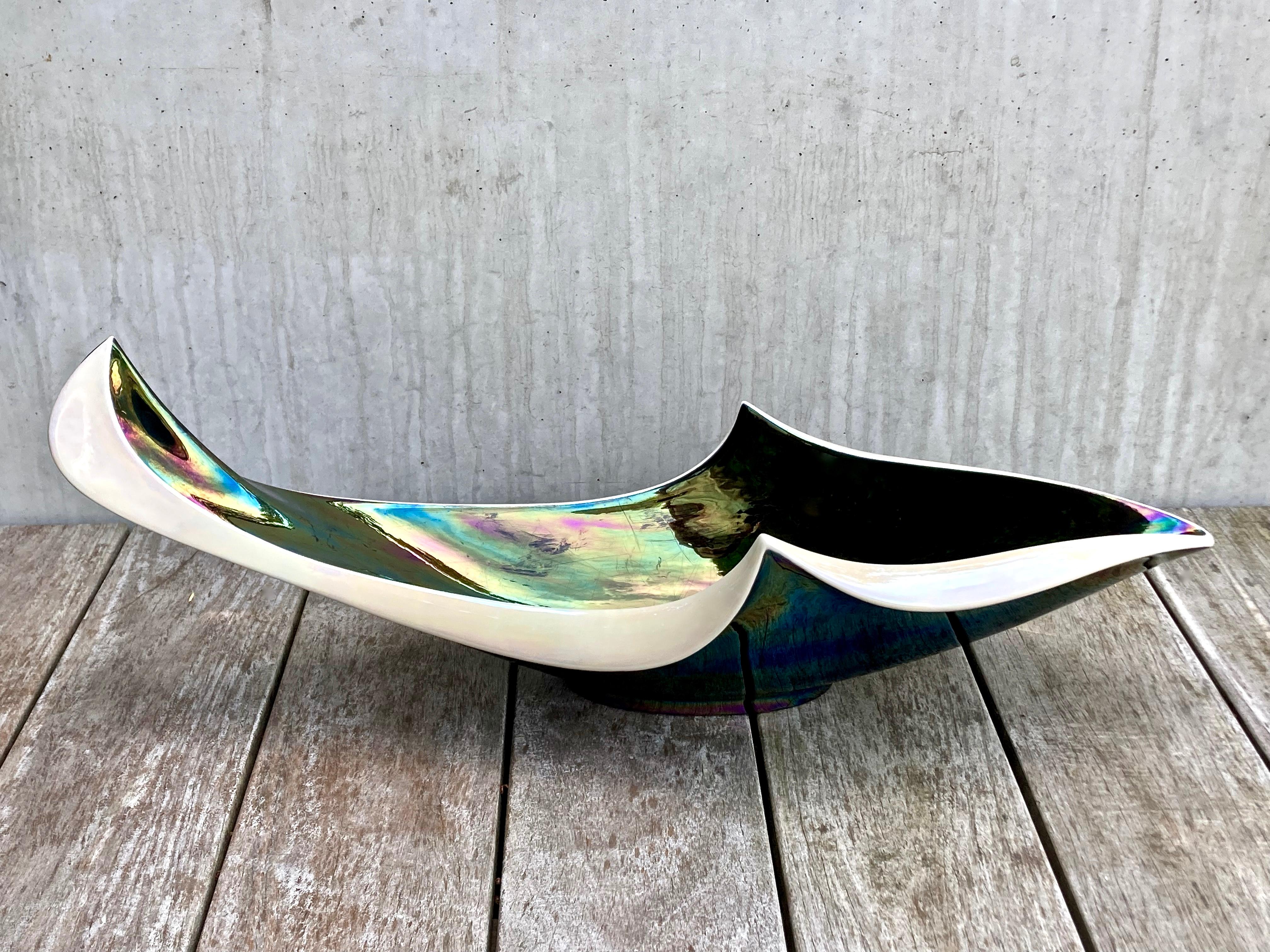 Mid-century modern at its very best. An iconic piece of authentic mid-century French art pottery. Most collectible! 

This incredible piece, it would be an understatement to simple call it a fruit bowl, was made by the French ceramic company