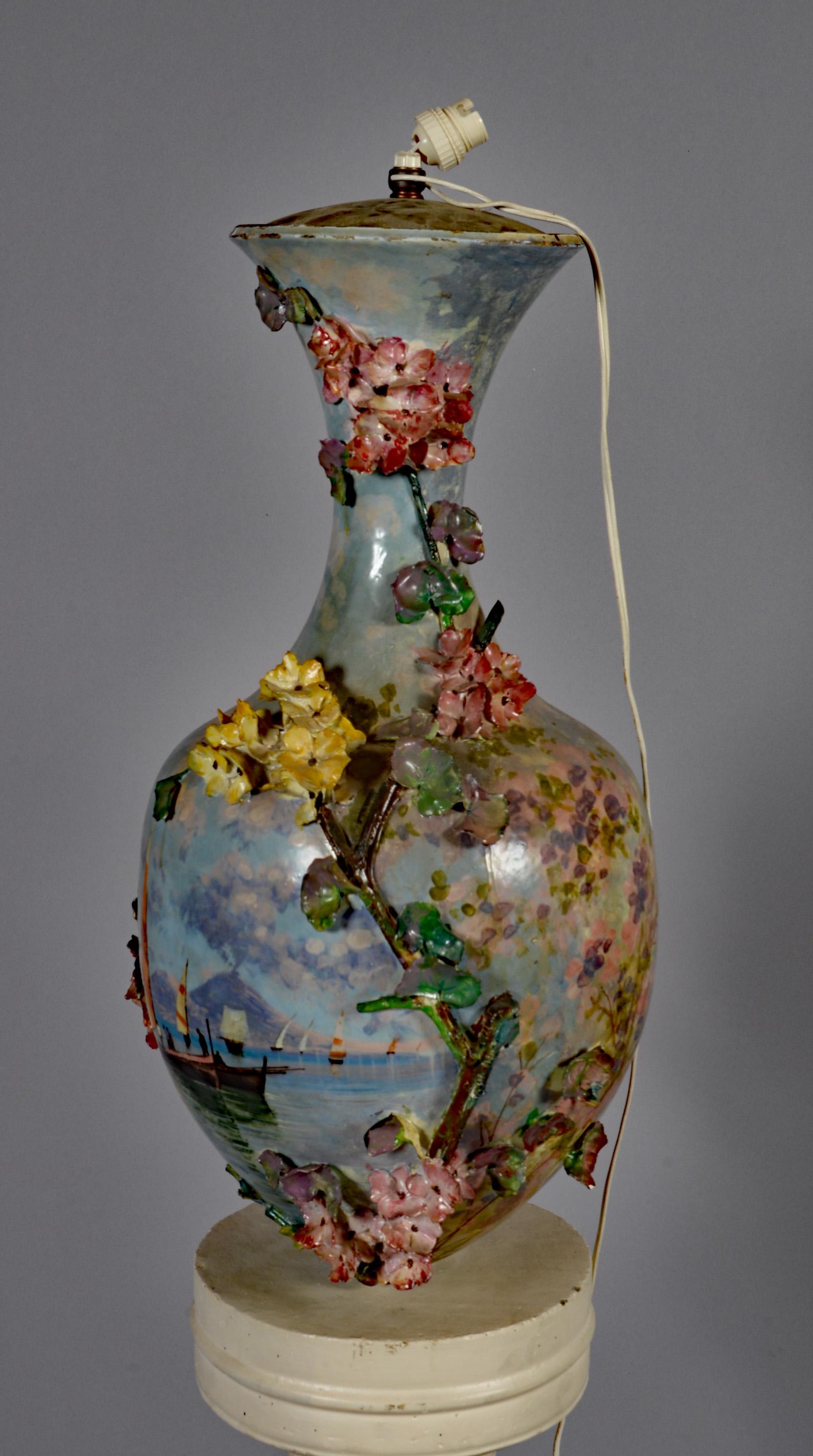 Large impressionist ceramic, mounted as a lamp (pierced bottom) with decoration of boats and flowering trees, late 19th century
currently presented with a large patinated plaster candlestick
sold with or without its support.
small losses
lampshade