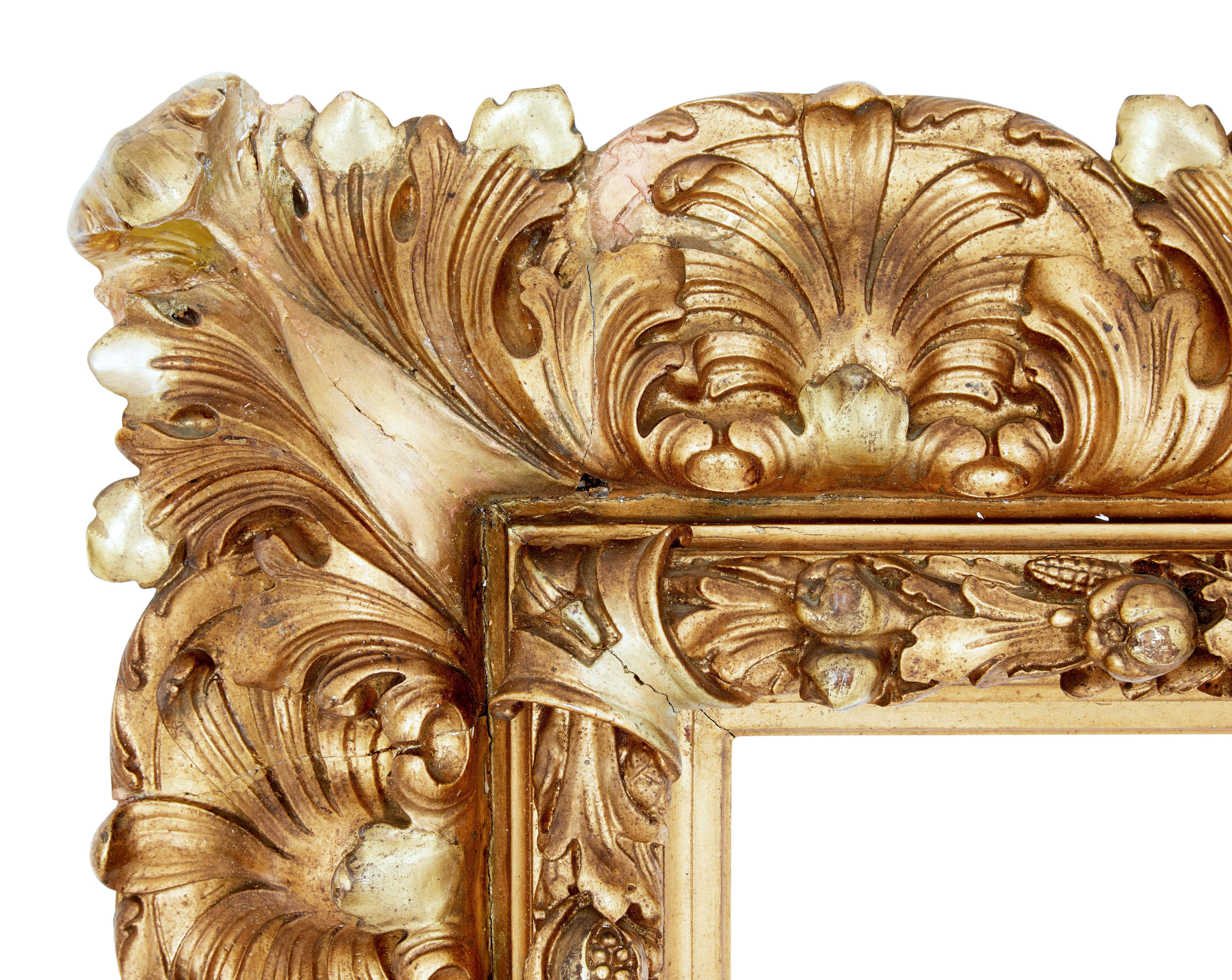 Large impressive 19th century rococo revival gilt frame circa 1890

Great opportunity to turn this decorative frame into a fantastic wall decoration.  Inner slip with carved pods and leaves surrounded by scrolling leaves on the outside.

Internal
