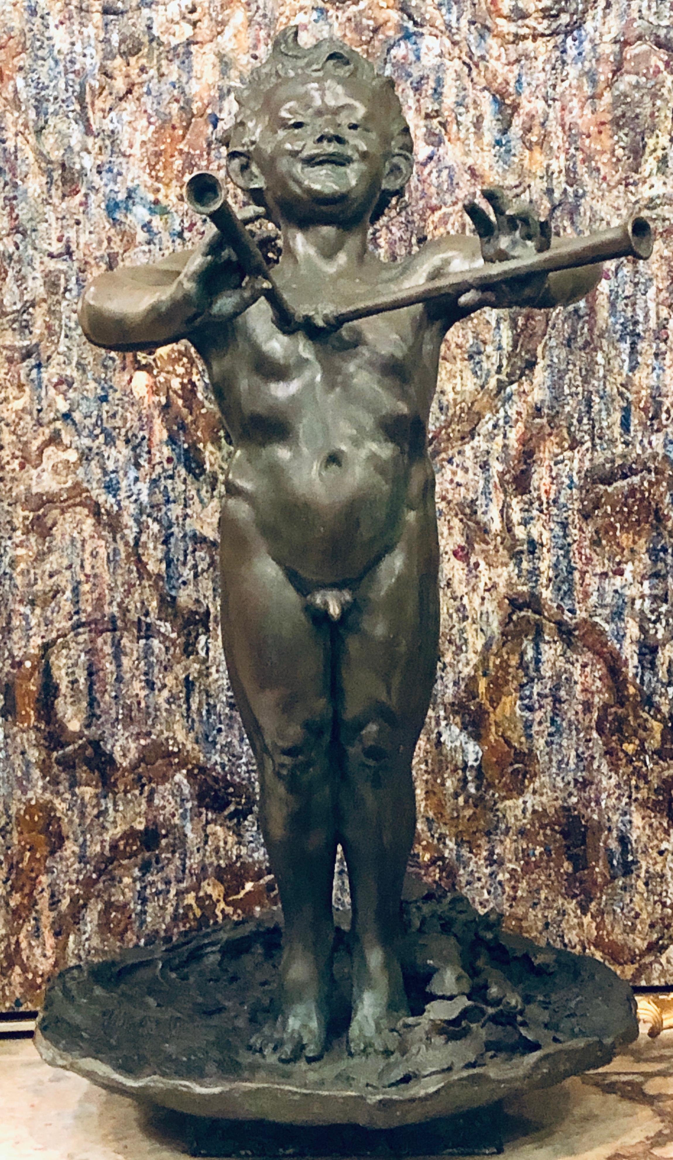 A large and impressive 19th century bronze flute playing pan fixture / sculpture. This magnificently chiseled and sculptured bronze of a full bodied naked young man can Stand on his own, center table, in any room or setting as well as sit atop a