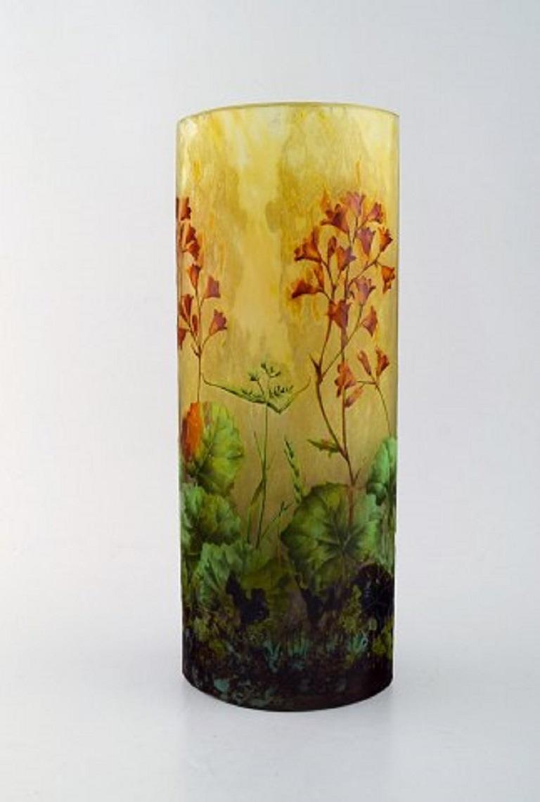 Large and impressive Daum Nancy Art Nouveau vase in mouth-blown enameled art glass. Acid-etched glass. Hand painted red flowers and branches in relief, late 19th century.
In very good condition.
Measures: 30 x 11.5 cm.
Signed with Lorraine