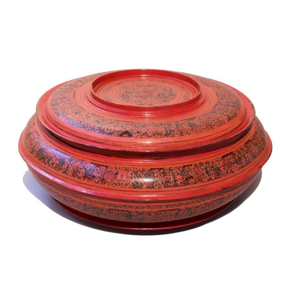 Exceptional Large Incised Lacquer Hsun-ok Offering Box With Interior Tray, Bagan, 20th Century.
 
The large round bowl form is for holding cooked rice and the interior tray is for holding a variety of dishes. A large offering box such as this is