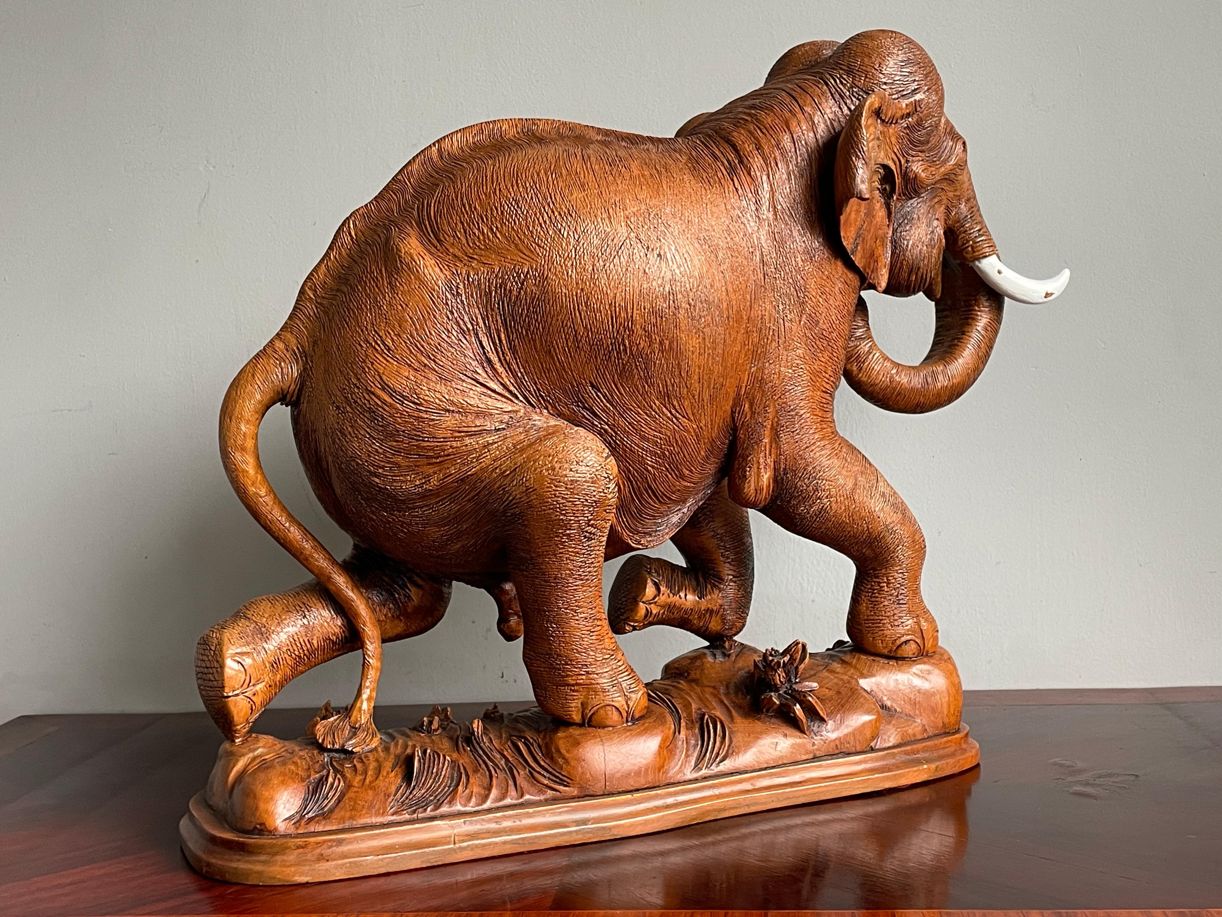 Felt Large & Incredibly Detailed Midcentury Hand Carved Teak Elephant Sculpture Pair For Sale