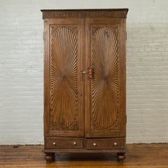 Large Indian Antique Wooden Cabinet with Carved Sunburst and Floral Motifs