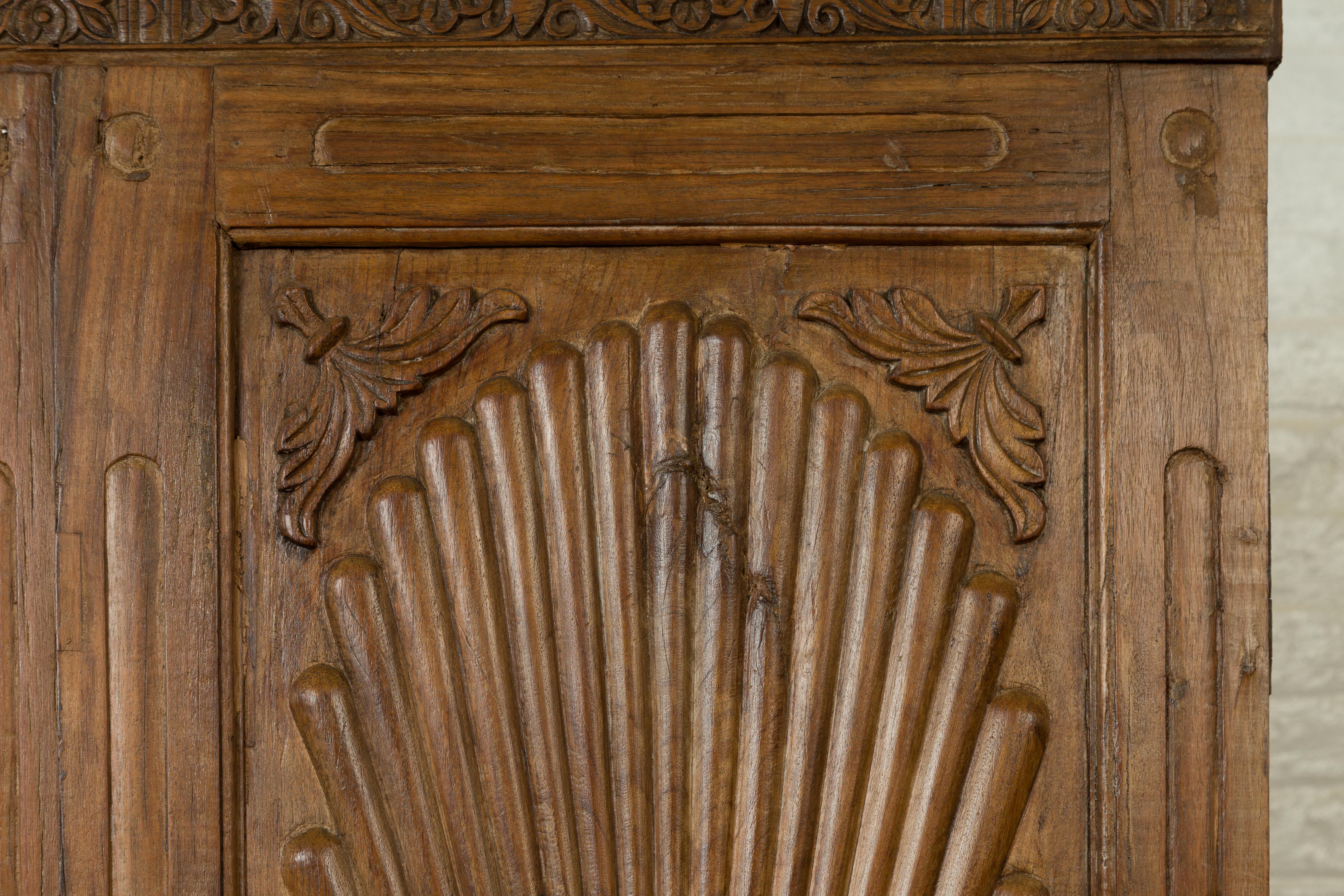 Large Indian Antique Wooden Cabinet with Carved Sunburst and Floral Motifs 2