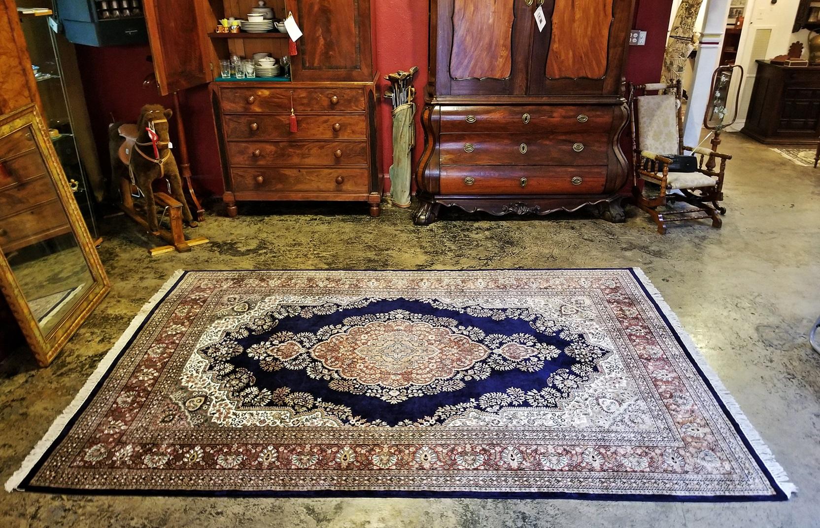 Made in Kashmir, India from really luxurious silk. Large area rug

Sapphire blue with floral motif's in greens, browns, creams etc.

Early 20th century, circa 1930.

Simply stunning and in perfect condition !!

Provenance: Bought in Ireland