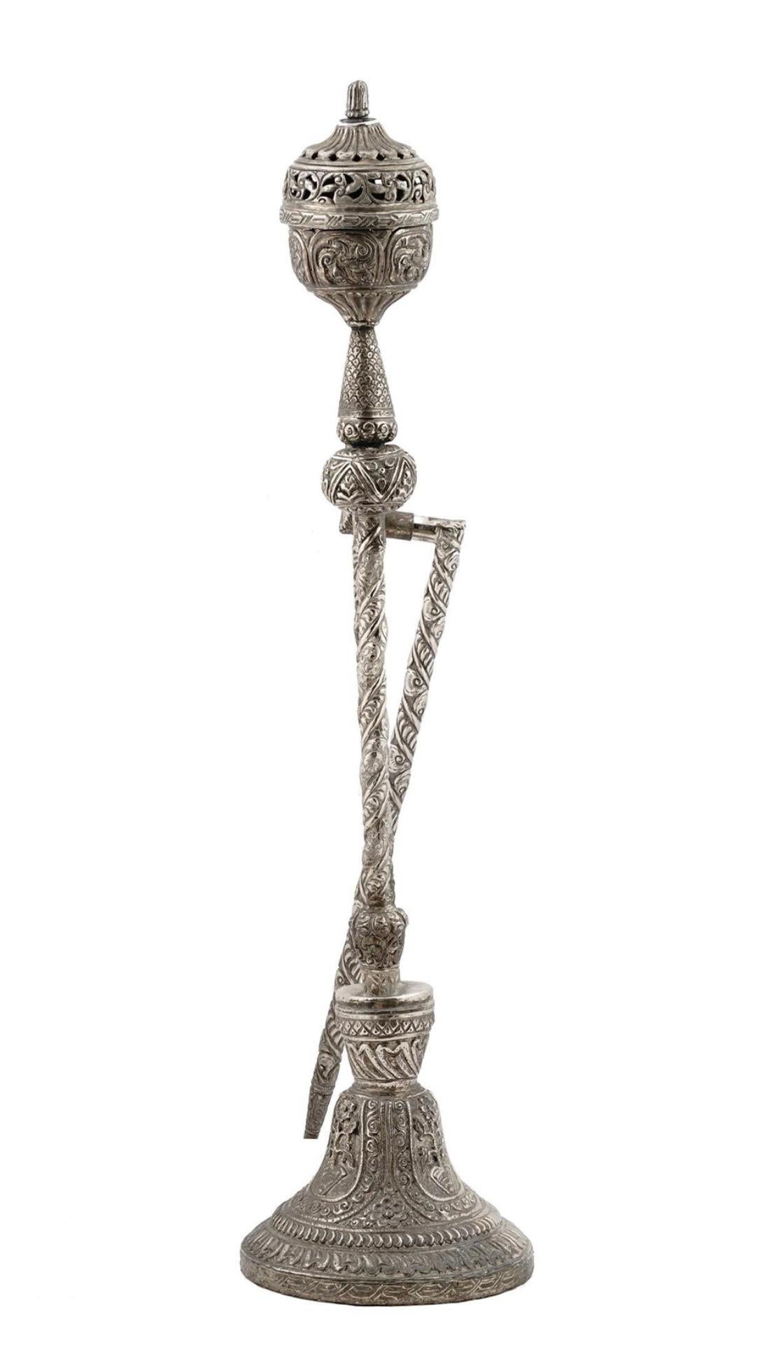  Large Indian repouse Middle Eastern style Silver plated  Hookah measuring 34 inches tall on stand measuring 8 1/4 inches across.  In good conditi