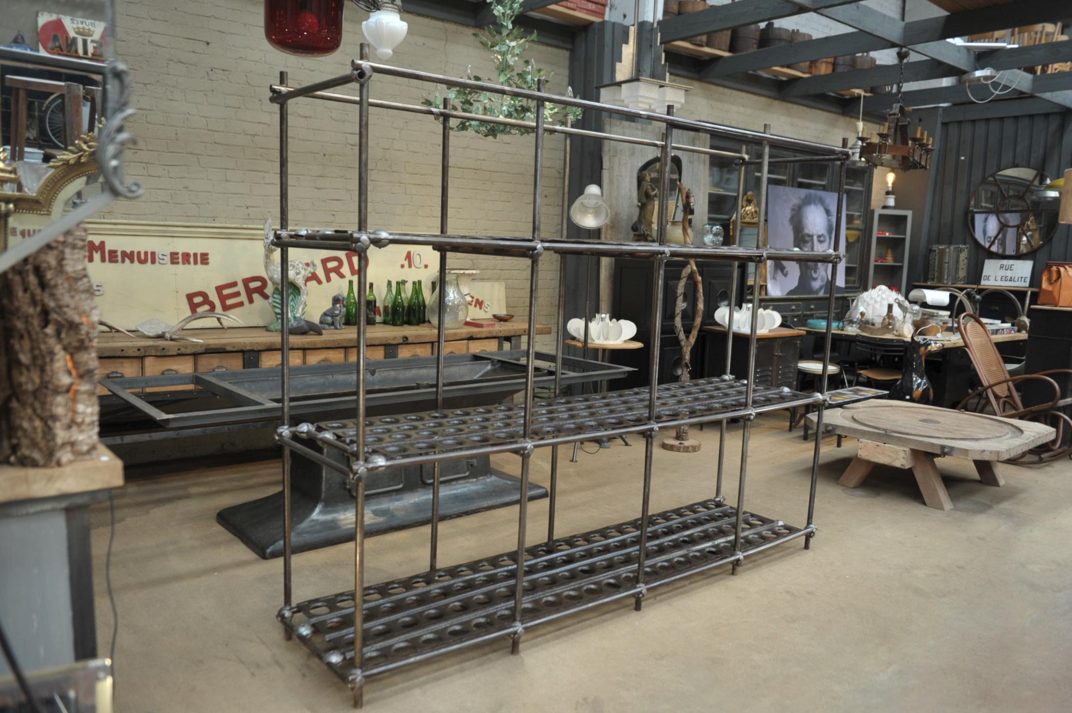 3 tier Industrial large shelve in polished iron. Each element can be taken apart and remove where you want and can taken apart for shipping if needed. circa 1950 very fine hand polish finish.