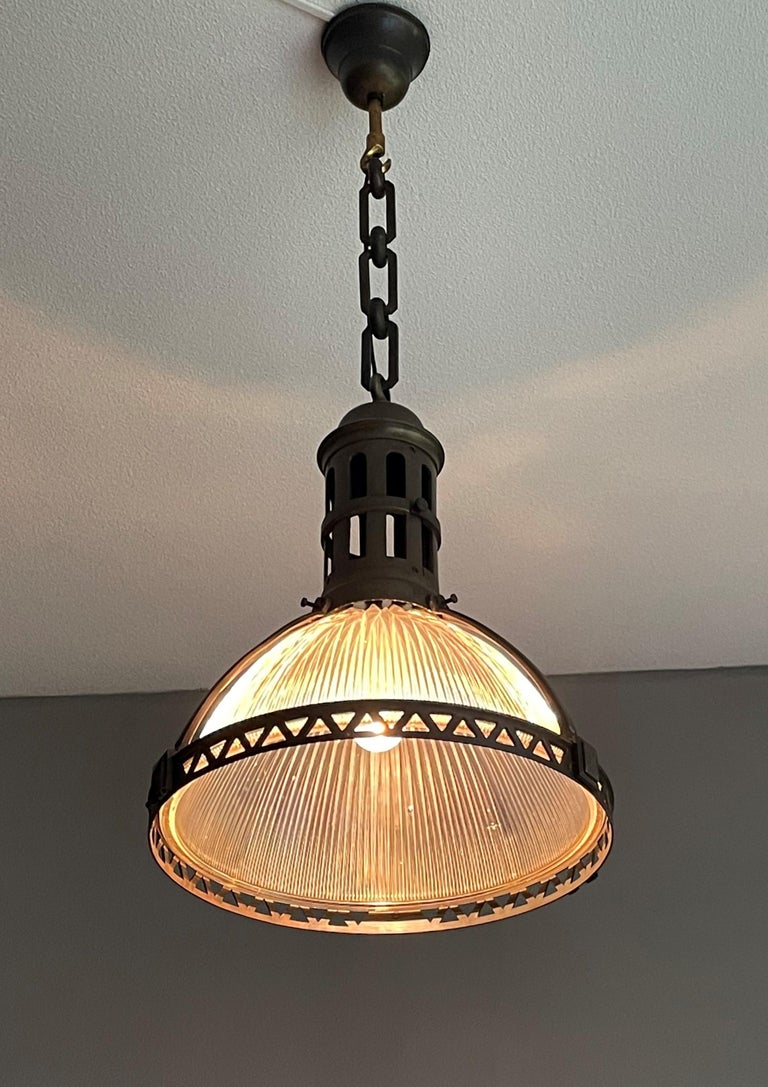 Antique Holophane light fixture, made in France.

For the collectors and enthousiasts of stylish Arts & Crafts light fixtures we also have this large and great looking Holophane pendant. Connoisseurs will imediately notice that the bottom shade of