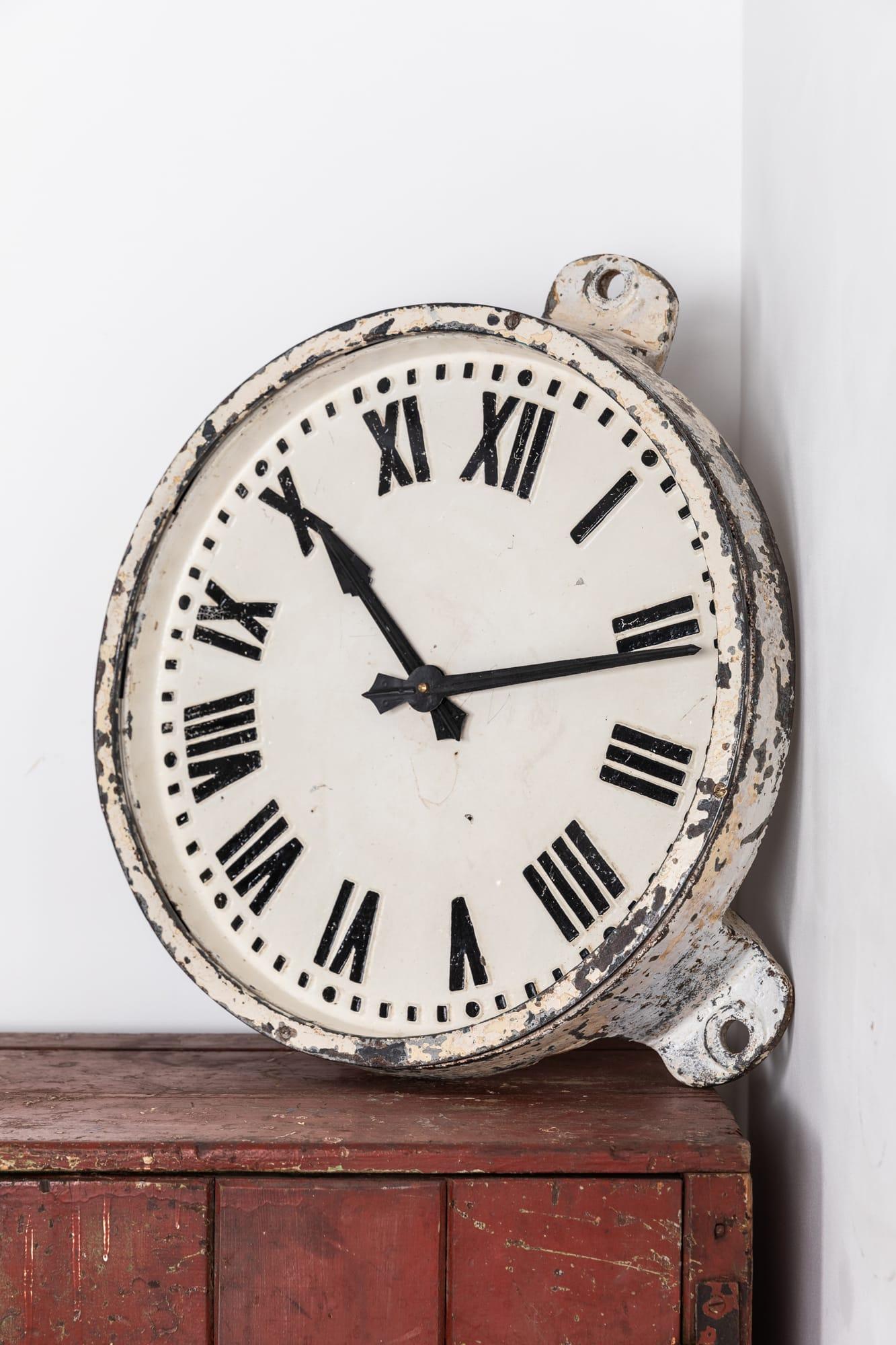 

Large cast iron factory clock manufactured by renowned electrical company Gents of Leicester. c.1930

Almost certainly used in an industrial setting, this clock retains it's remnants of it's old white paint. Clean, bright face with raised