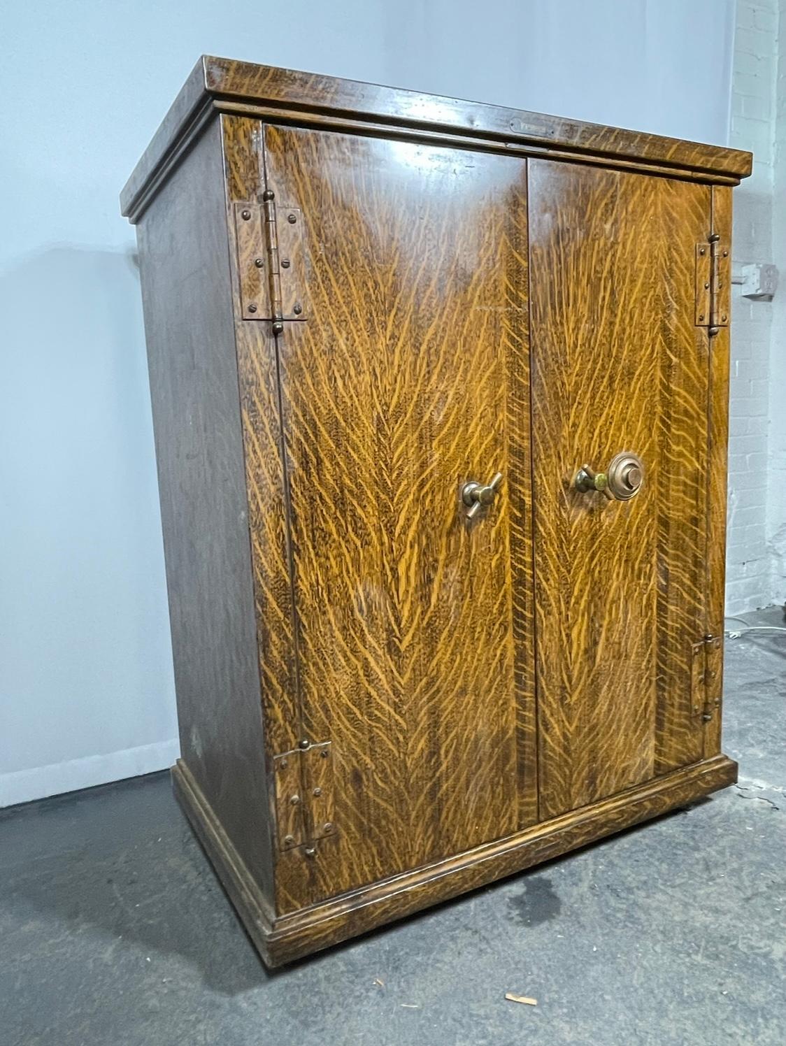 Large Industrial  Faux Wood Grain Metal Safe, dry bar, storage  In Good Condition For Sale In Buffalo, NY