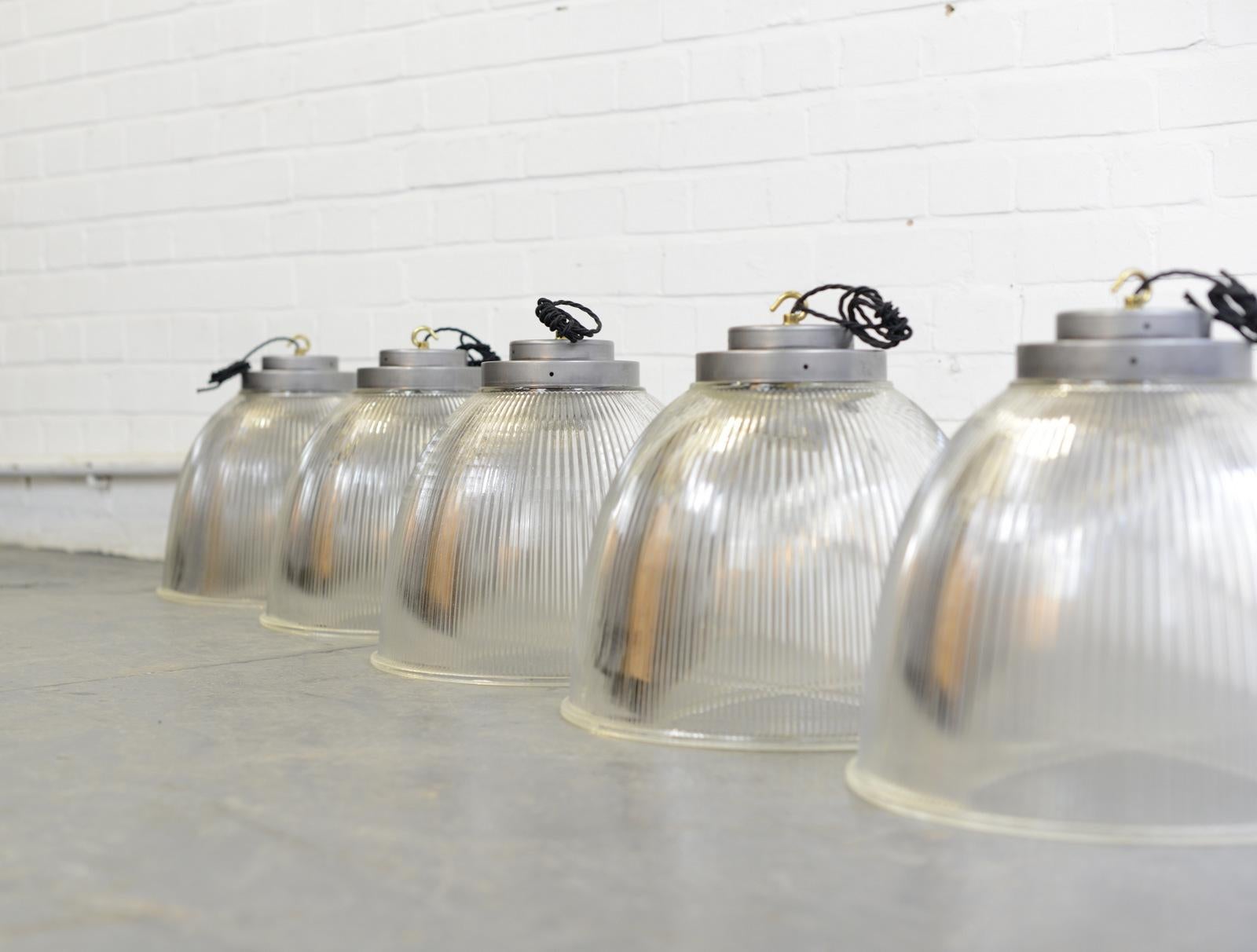 Large industrial Holophane pendant lights, circa 1950s

- Price is per light
- Heavy prismatic glass
- Stamped 