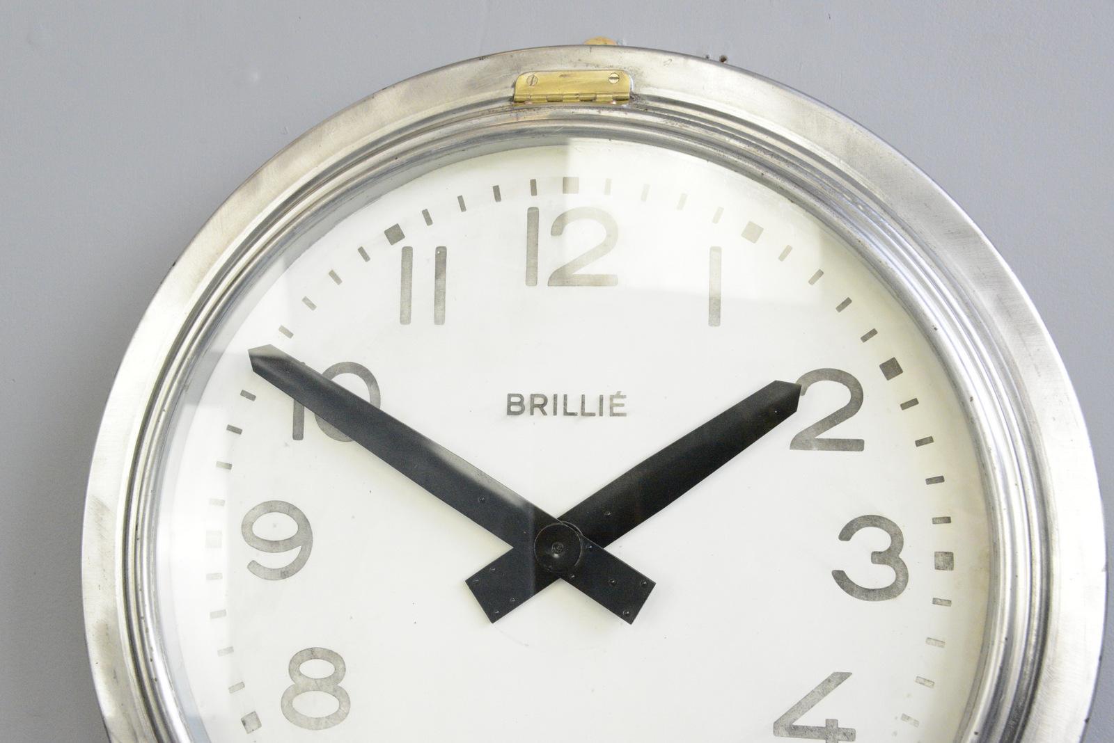Large industrial wall clock by Brillie, circa 1930s

- Steel dial with glass face
- New AA battery powered quartz motor
- Steel casing
- Produced by Brillie
- French, 1930s
- Measures: 62cm wide x 13cm deep

Condition report

Fully
