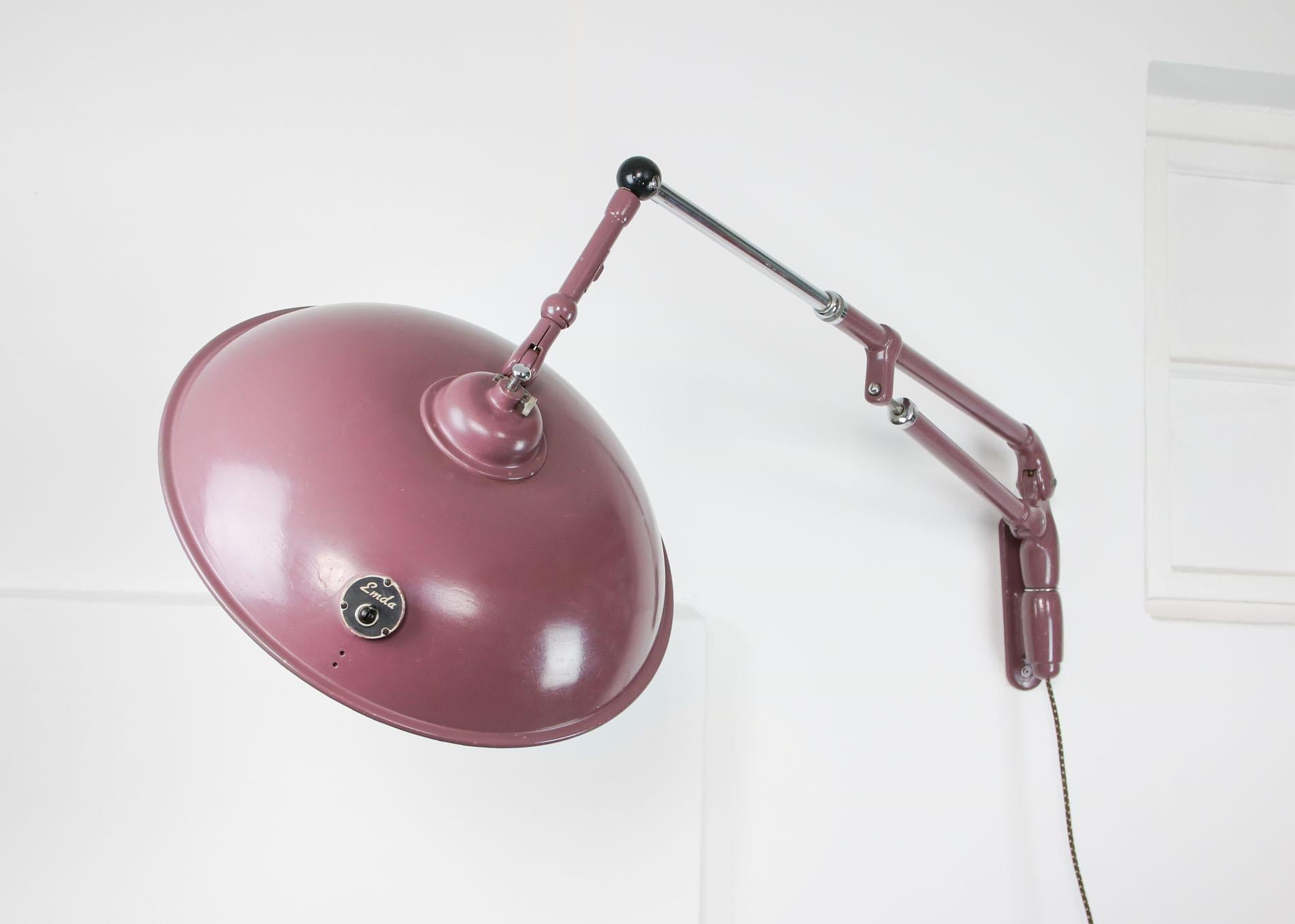- Rare and very well-preserved surgeon/dentist lamp
- produced by EMDA, a German brand of professional equipment
- Metal frame is lacquered violet/pink
- The suspension can adjusted and has a range from 130 to 160 cm
- Spotlight can be adjusted by