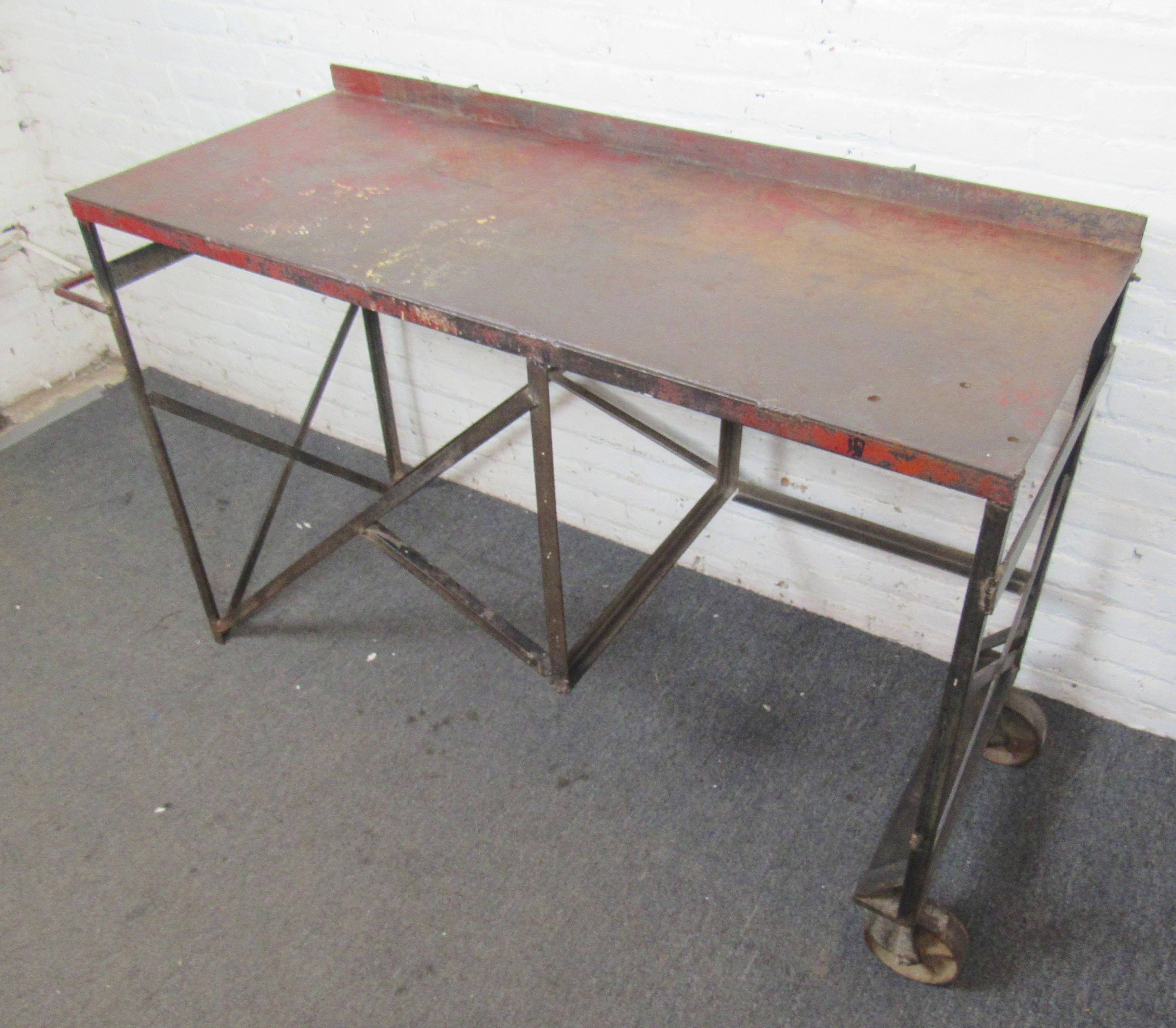 Large iron work table with caster wheels for easy mobility. Great for kitchen use.
Location: Brooklyn NY.