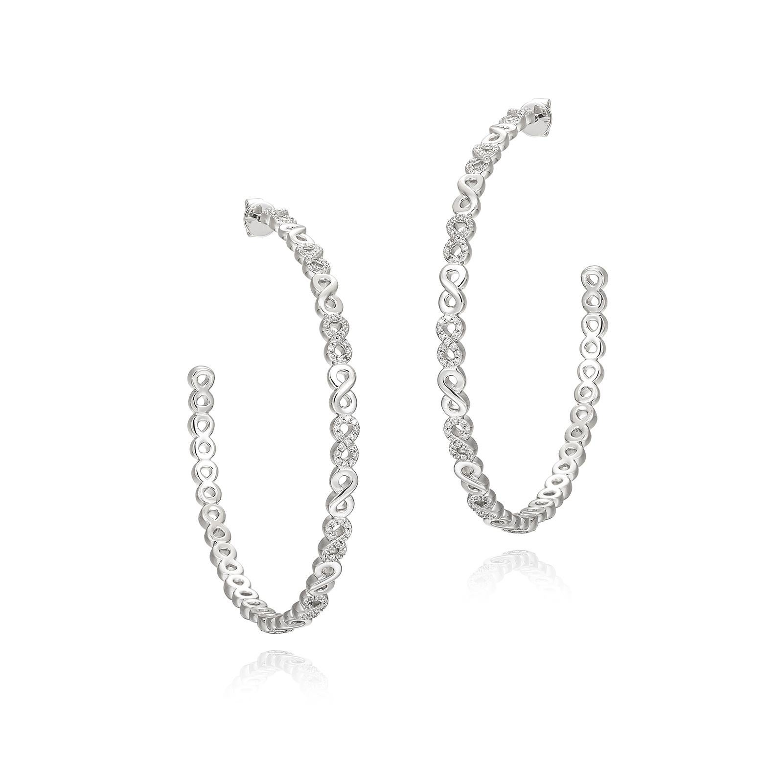 When it comes to self-expression, the style possibilities are endless. These large infinity pave hoops are a stunning statement of your infinite strength and enduring style; transitioning easily from day to night. .925 sterling silver base. Also