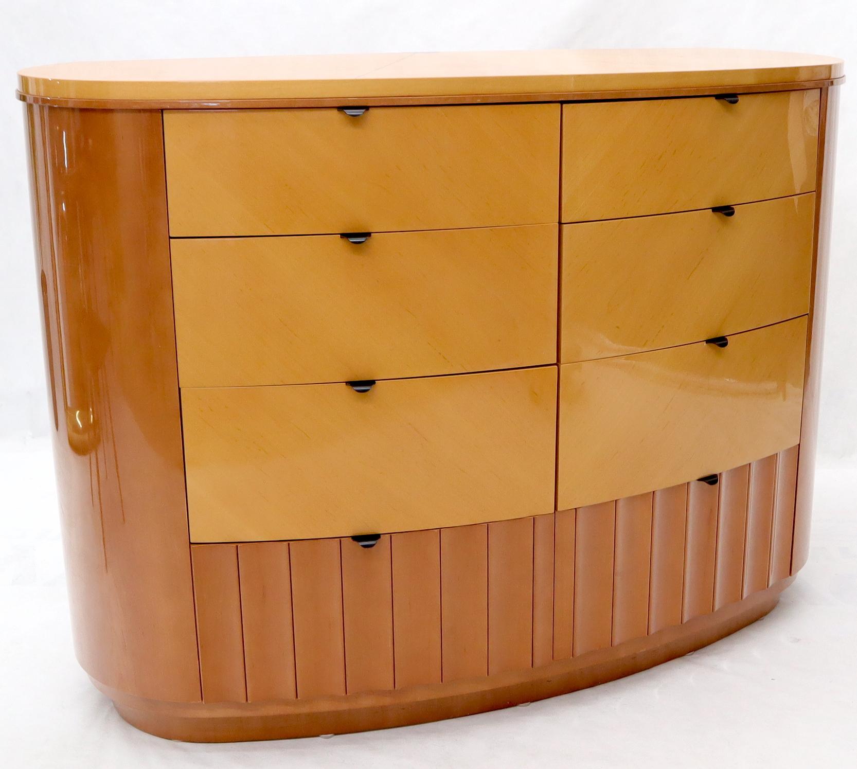 Mid-Century Modern kidney shape 8 drawers inlaid top dresser. Finished rosewood back. Made in Spain.