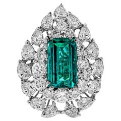 Large Insignificant Colombian Emerald and Diamond Ring
