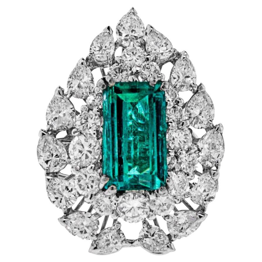 Large Insignificant Colombian Emerald and Diamond Ring