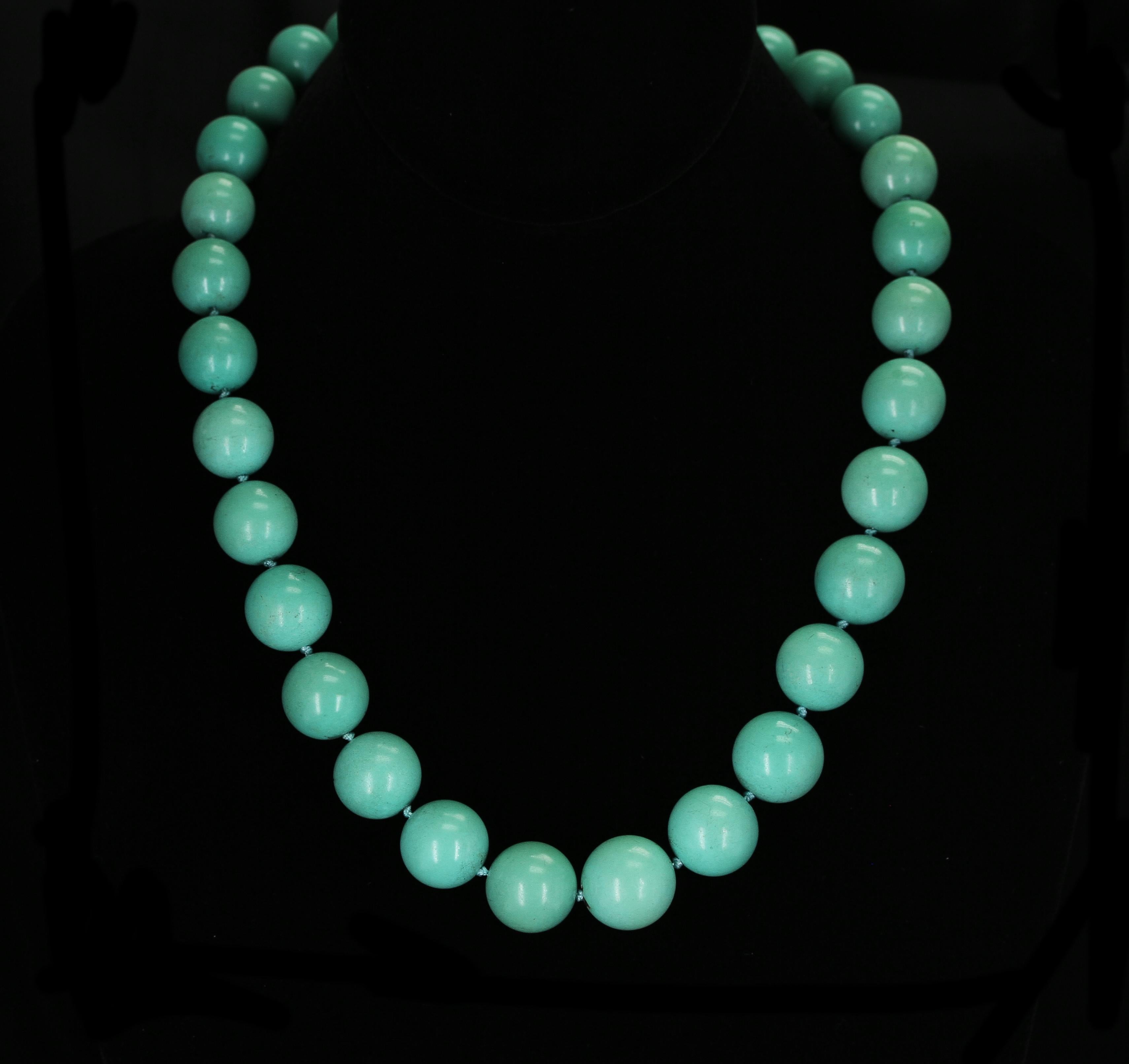 An exceptional strand of Round and Smooth Iranian Turquoise Beads ranging from 12.7MM to 17MM. GW: 625 cts. Length: 19.5