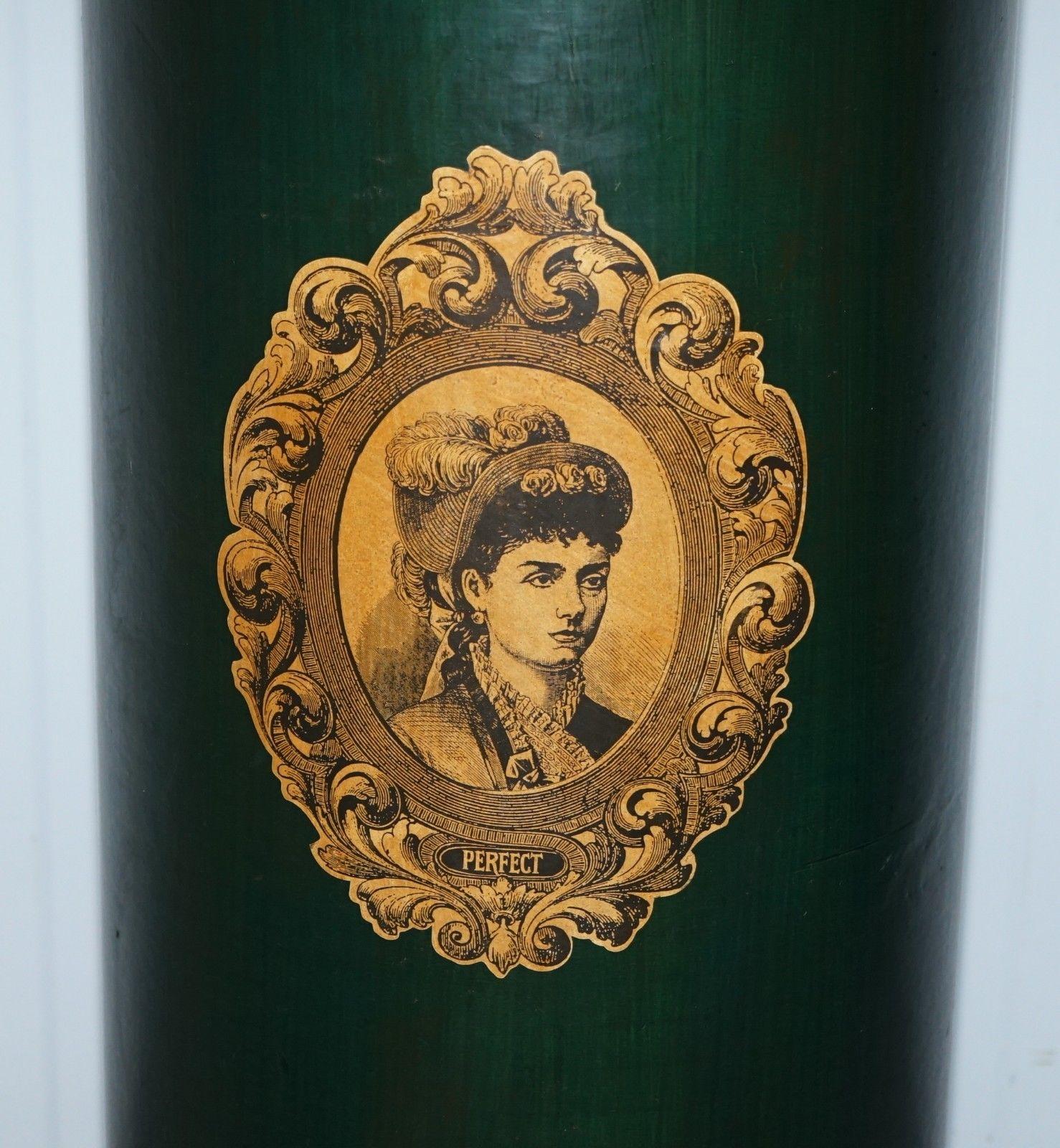 We are delighted to offer for sale this lovely hand made in Ireland green pedestal stand with Victorian lady picture

A good looking and decorative piece, I have no idea how old it is, I assume it was made for a shop or exhibition display

Its