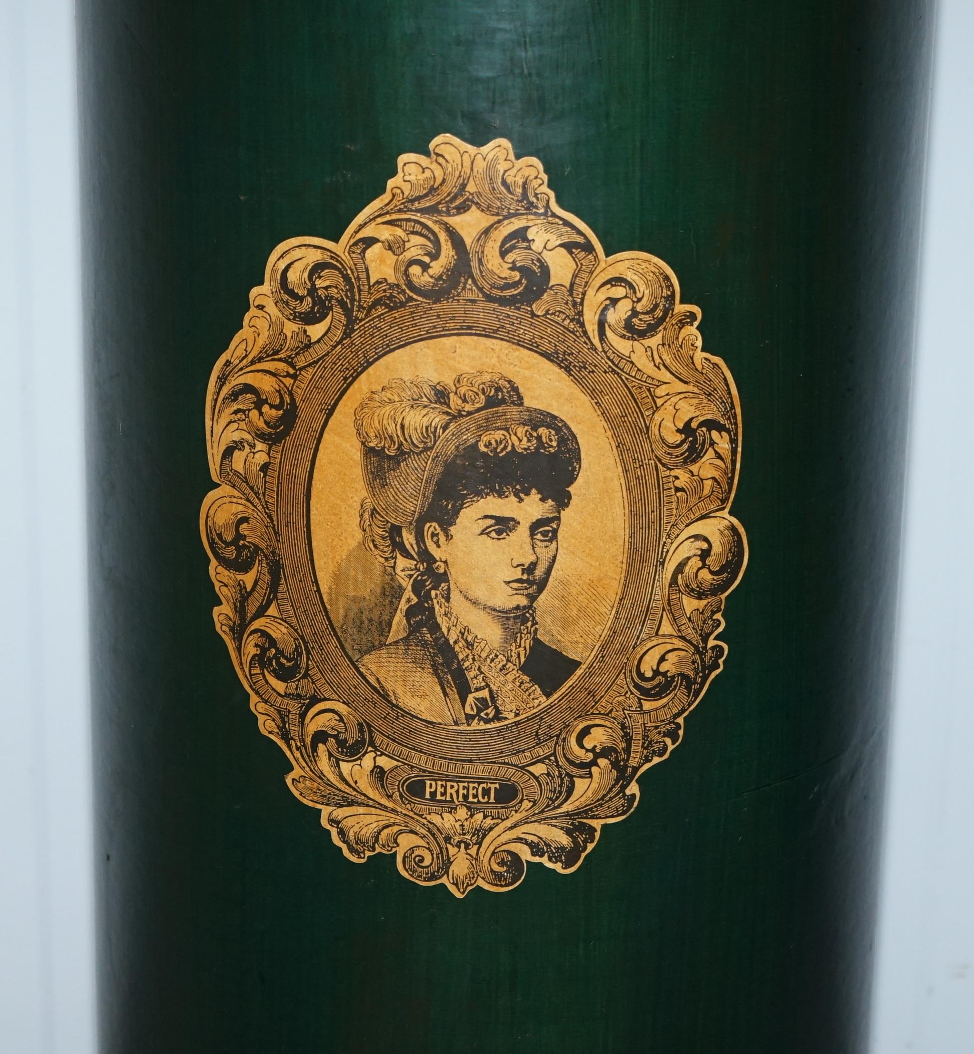 We are delighted to offer for sale this lovely handmade in Ireland green pedestal stand with Victorian lady picture

A good looking and decorative piece, I have no idea how old it is, I assume it was made for a shop or exhibition display

Its