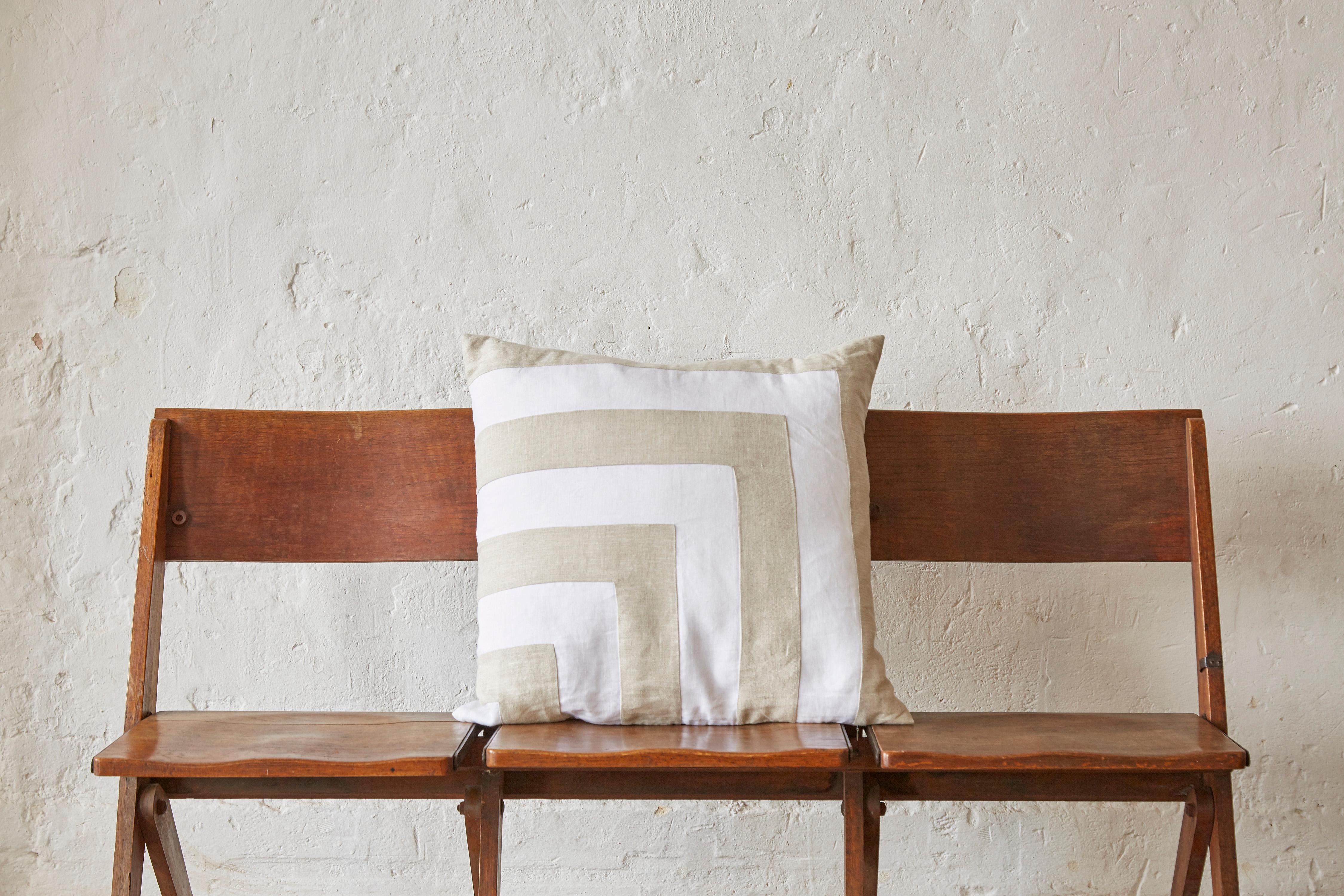 A custom made luxury contemporary pillow (cushion) of 100% pure Irish linen. A signature combination of Classic pristine white matched with traditional oatmeal. From a vintage batch of fabric new and unused, with the old mill labelling still