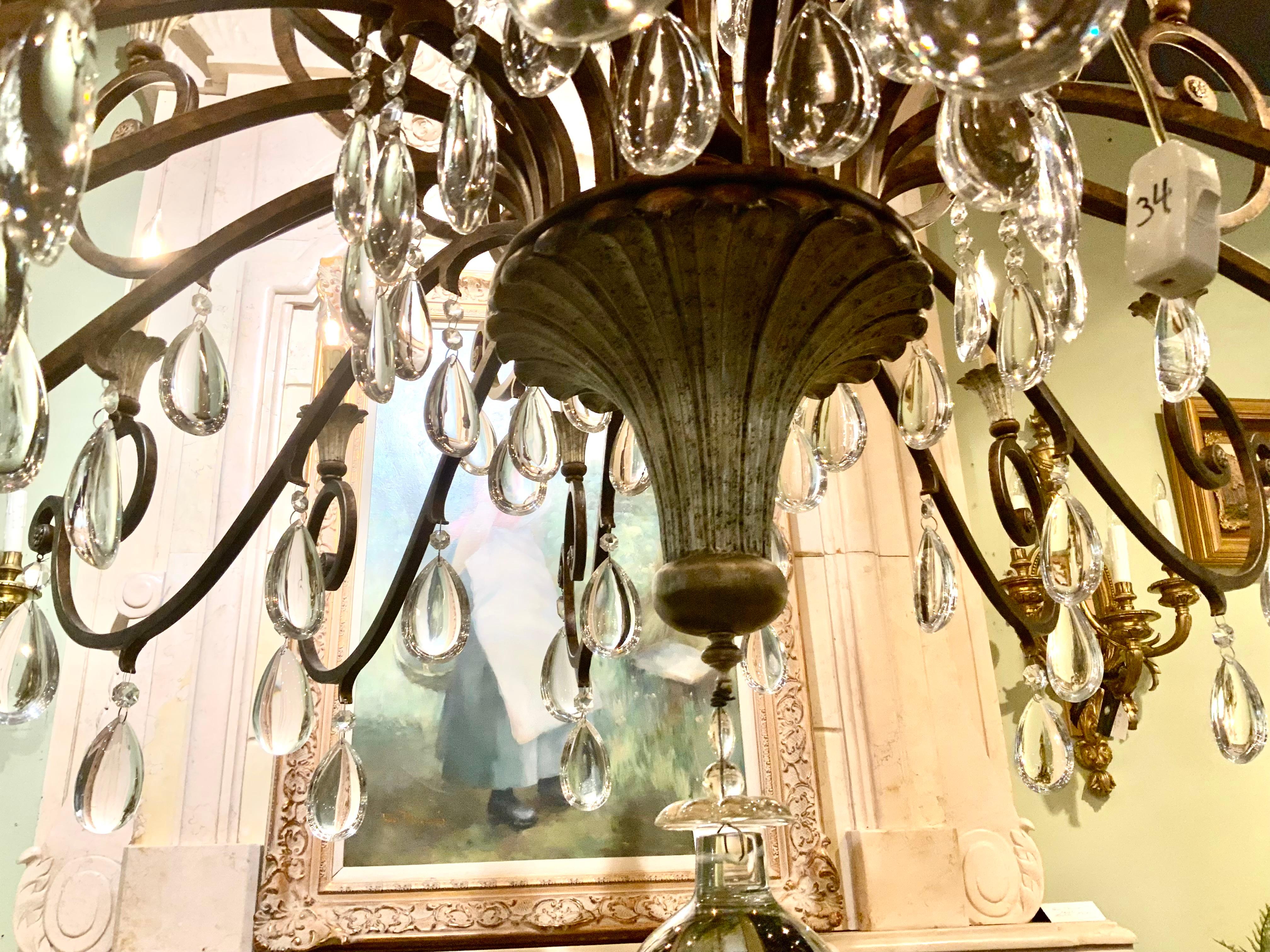 Large iron and crystal 29 light chandelier  In Excellent Condition For Sale In Houston, TX