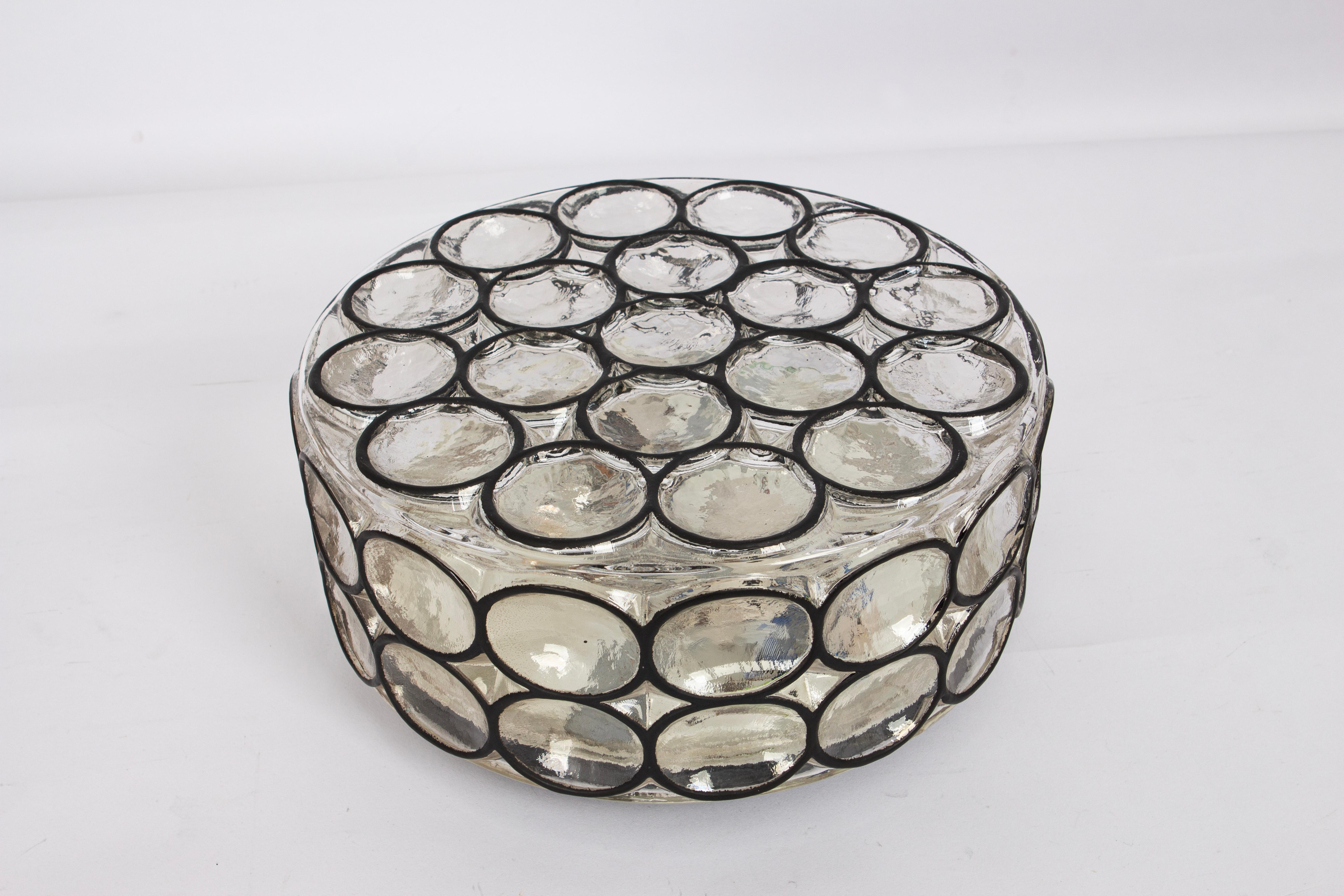 Large Minimalist iron and clear glass ceiling or wall light manufactured by Limburg Glashütte, Germany, circa 1960-1969.

Heavy quality and in very good condition. Cleaned, well-wired and ready to use. The fixture requires 2 x E27 standard bulbs