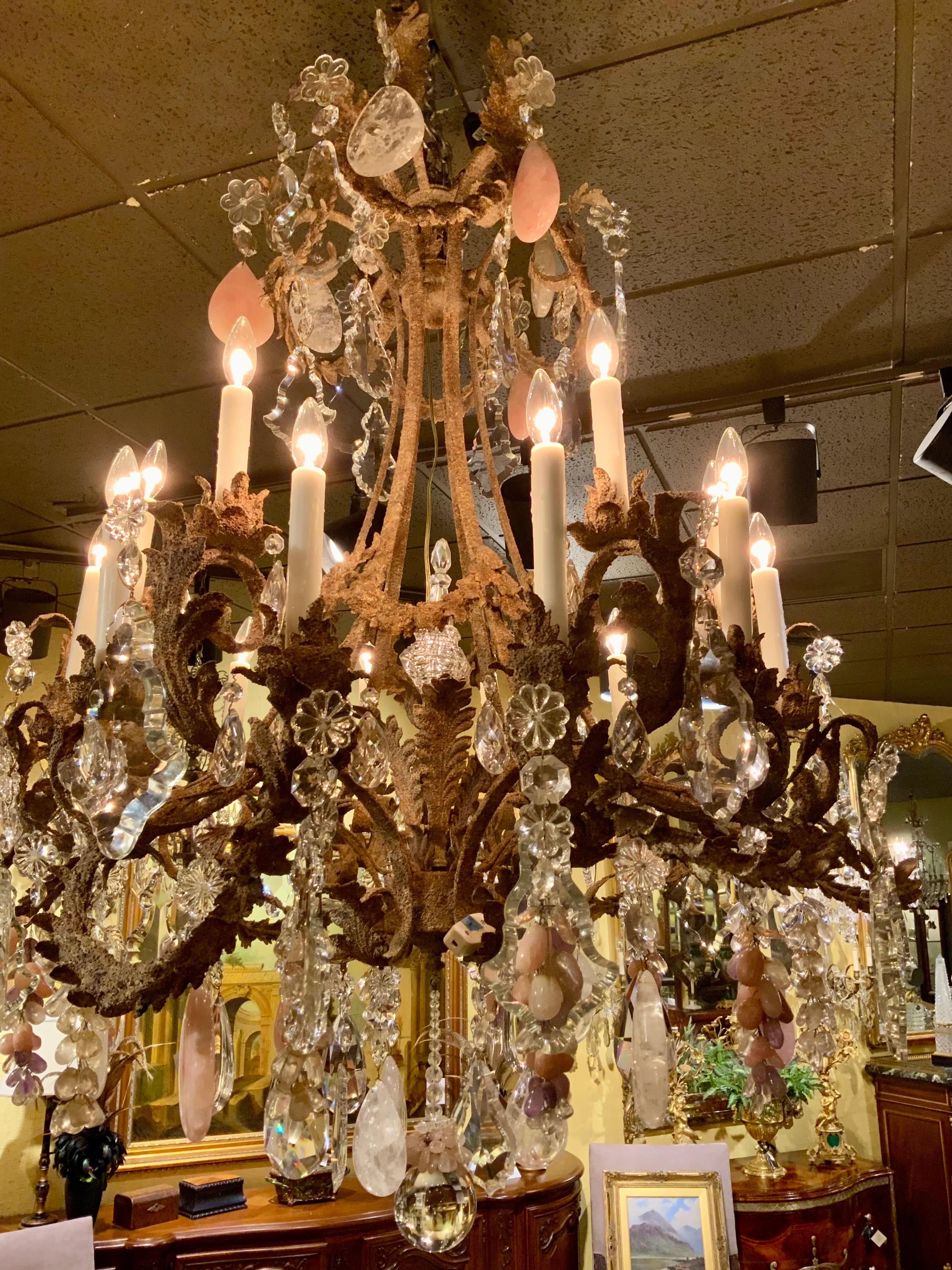 Italian Large iron chandelier, custom finish with clear, rock,  rose quartz and amethyst For Sale