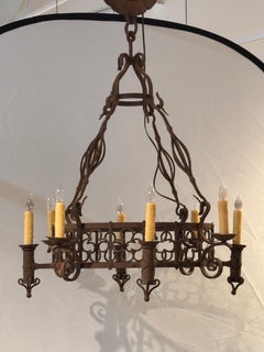 Large Iron Chandelier With Gothic-Inspired Scrollwork