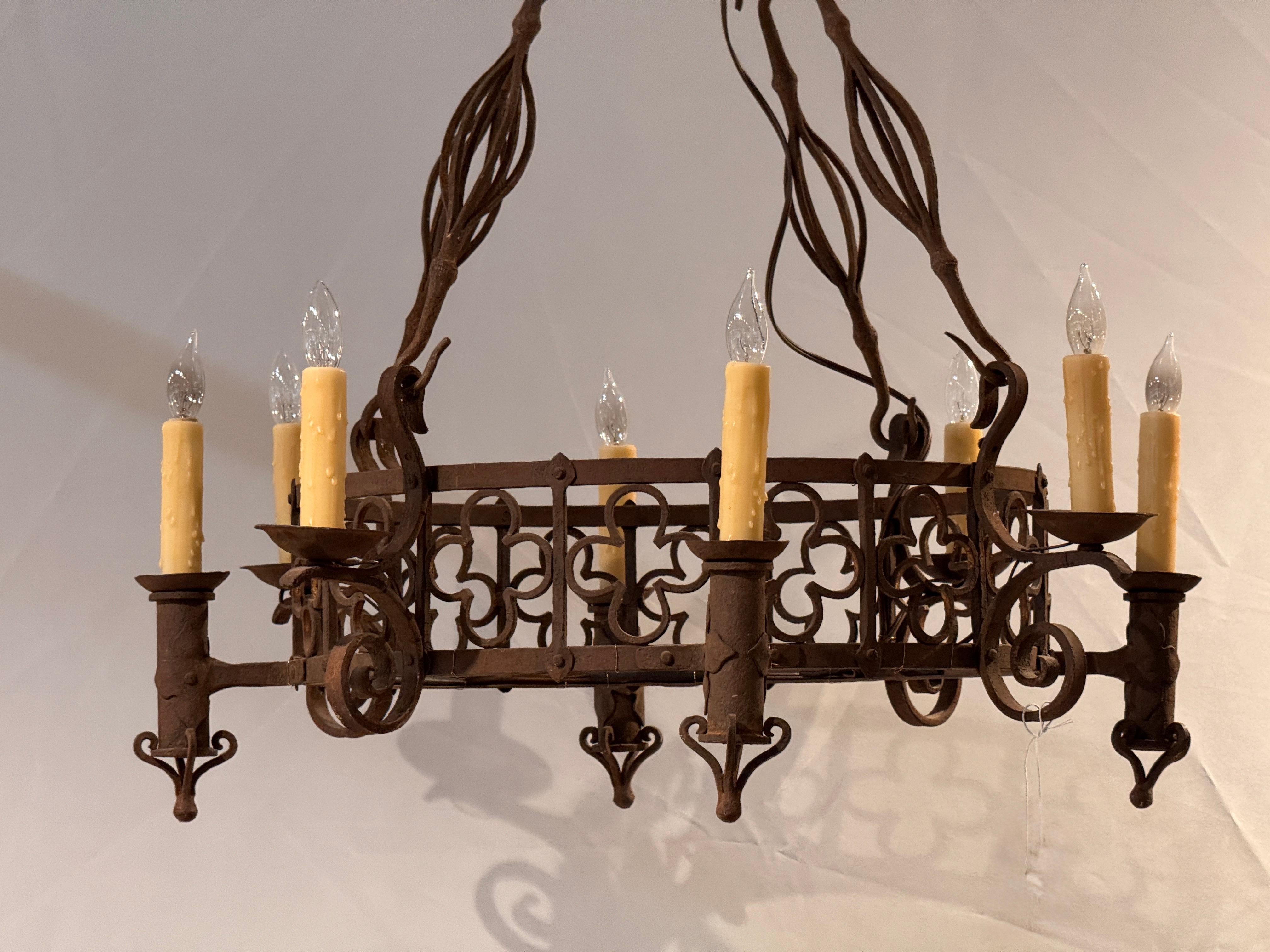 Italian Large Iron Chandelier With Gothic-Inspired Scrollwork For Sale