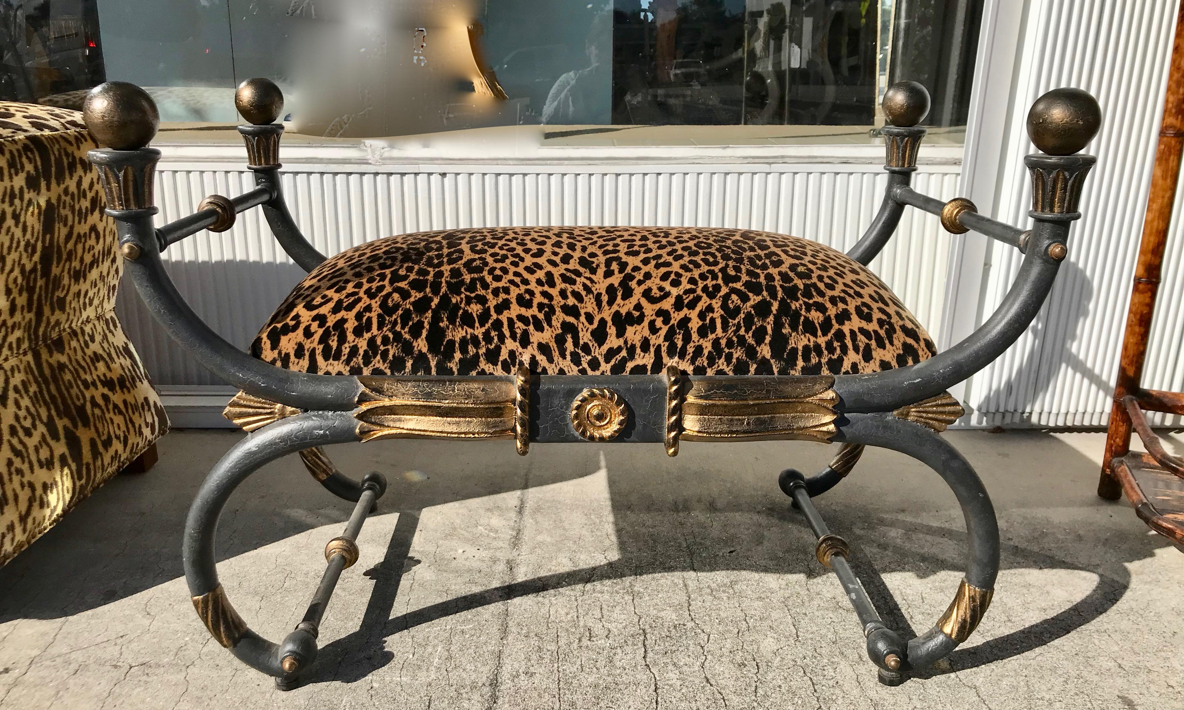 Fabulous eye catching quality.
The bench is appointed with gilt highlights and upholstered in a stunning
faux leopard fabric.