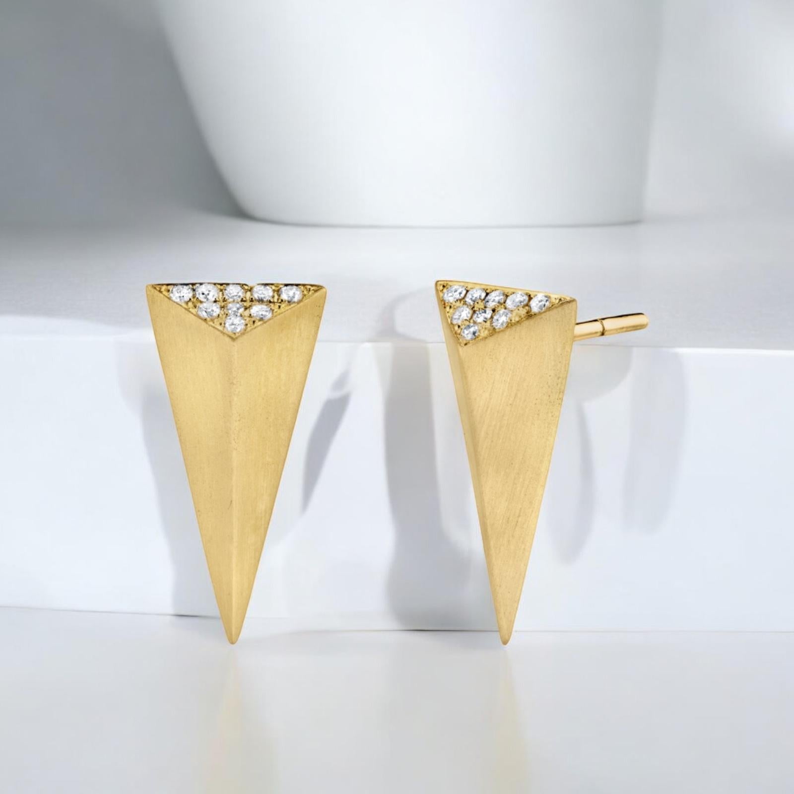 18k Yellow Gold Large Isosceles Diamond Studs from Karma El Khalil's Rock Hall Collection are a statement of elegance and contemporary design. These studs showcase the designer's signature three-dimensional geometric isosceles shape, making them an