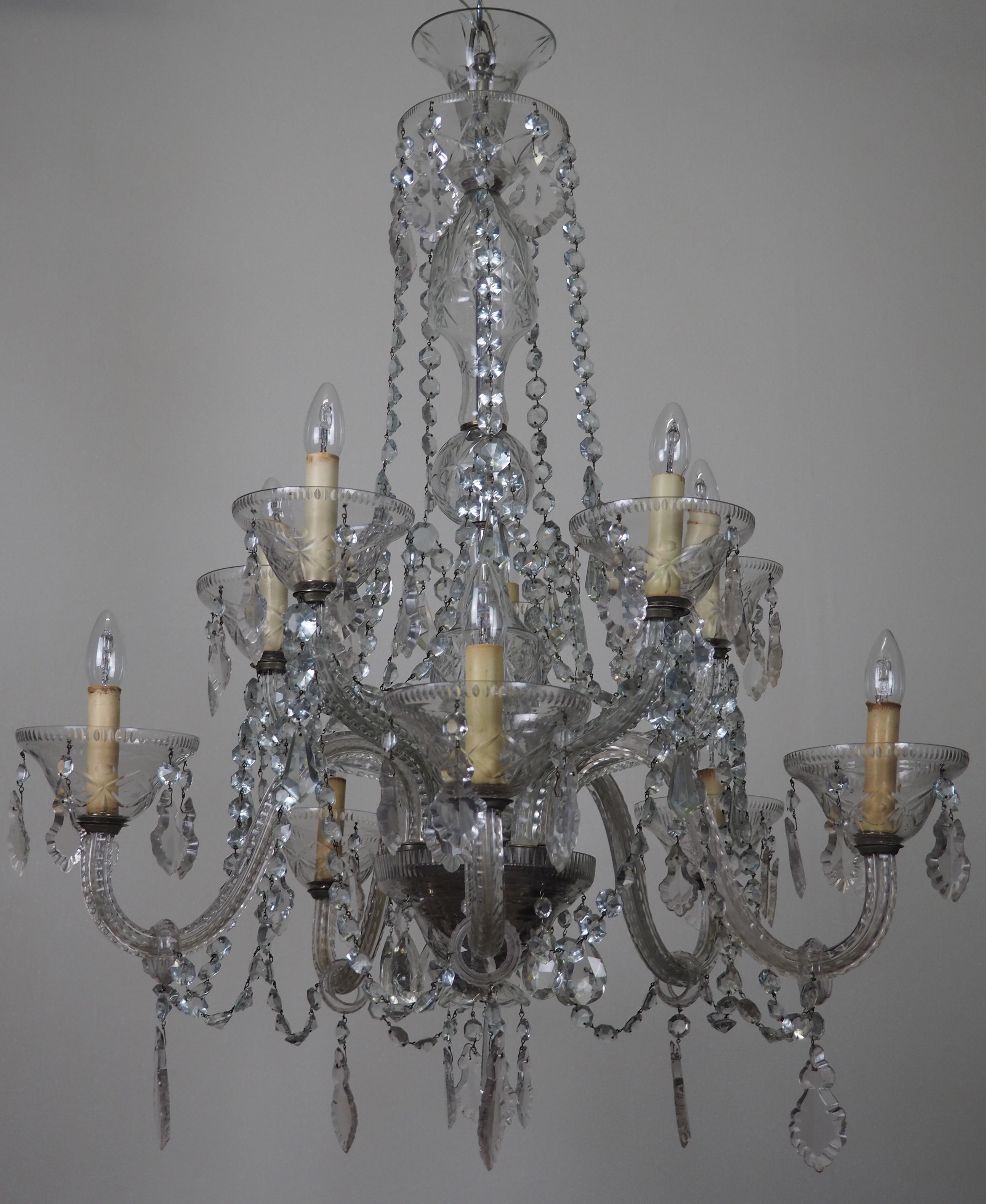 A wonderful large ten-light Murano glass and cut crystal silvered chandelier, Italy, circa 1920s.
This beautiful handcrafted fixture is made of silvered brass elements, Murano glass and cut crystals and needs 10 x Edison (e14) for standard screw