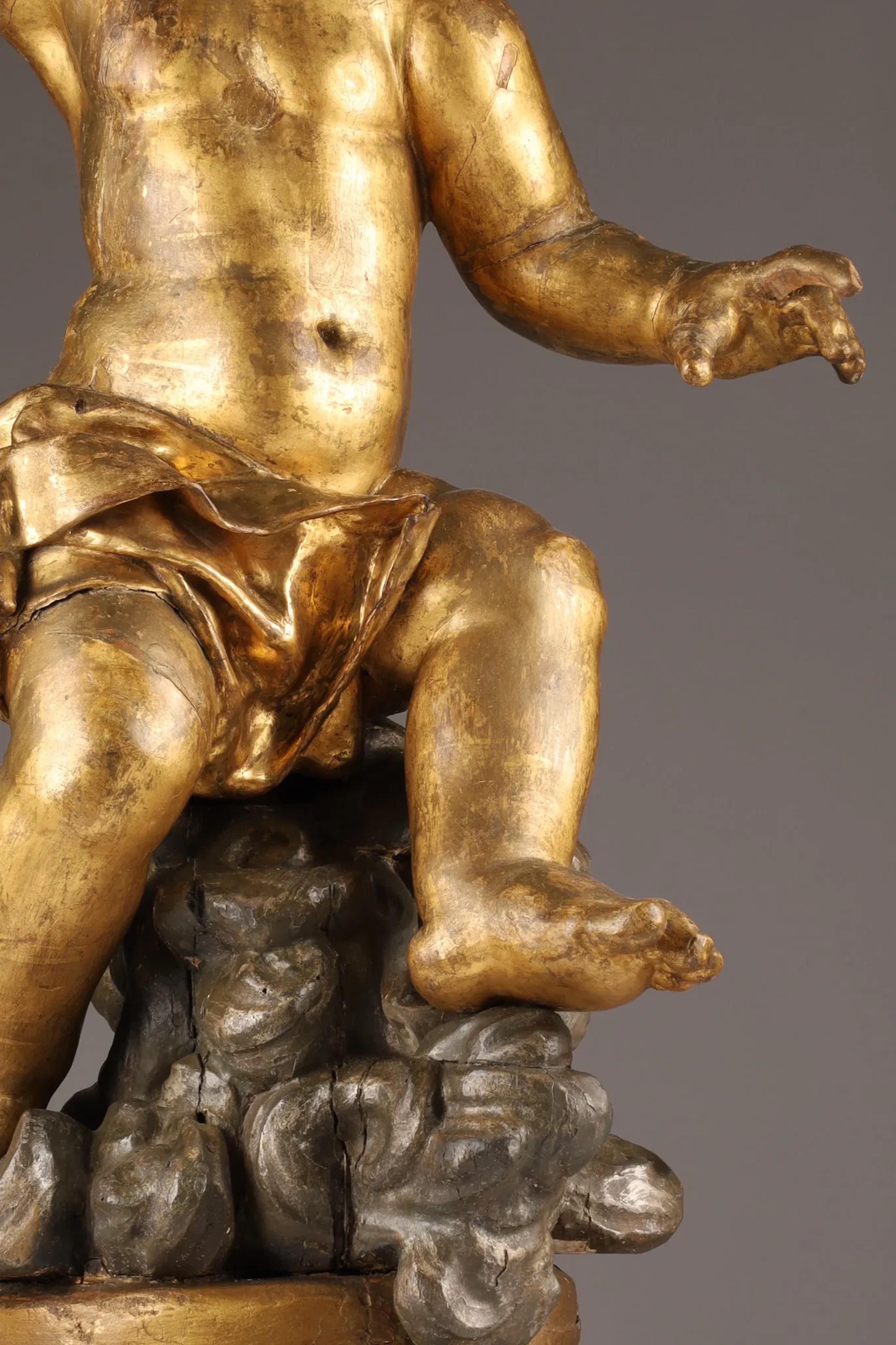 18th Century Large Italian 18th C Carved Giltwood Figure of a Putto For Sale
