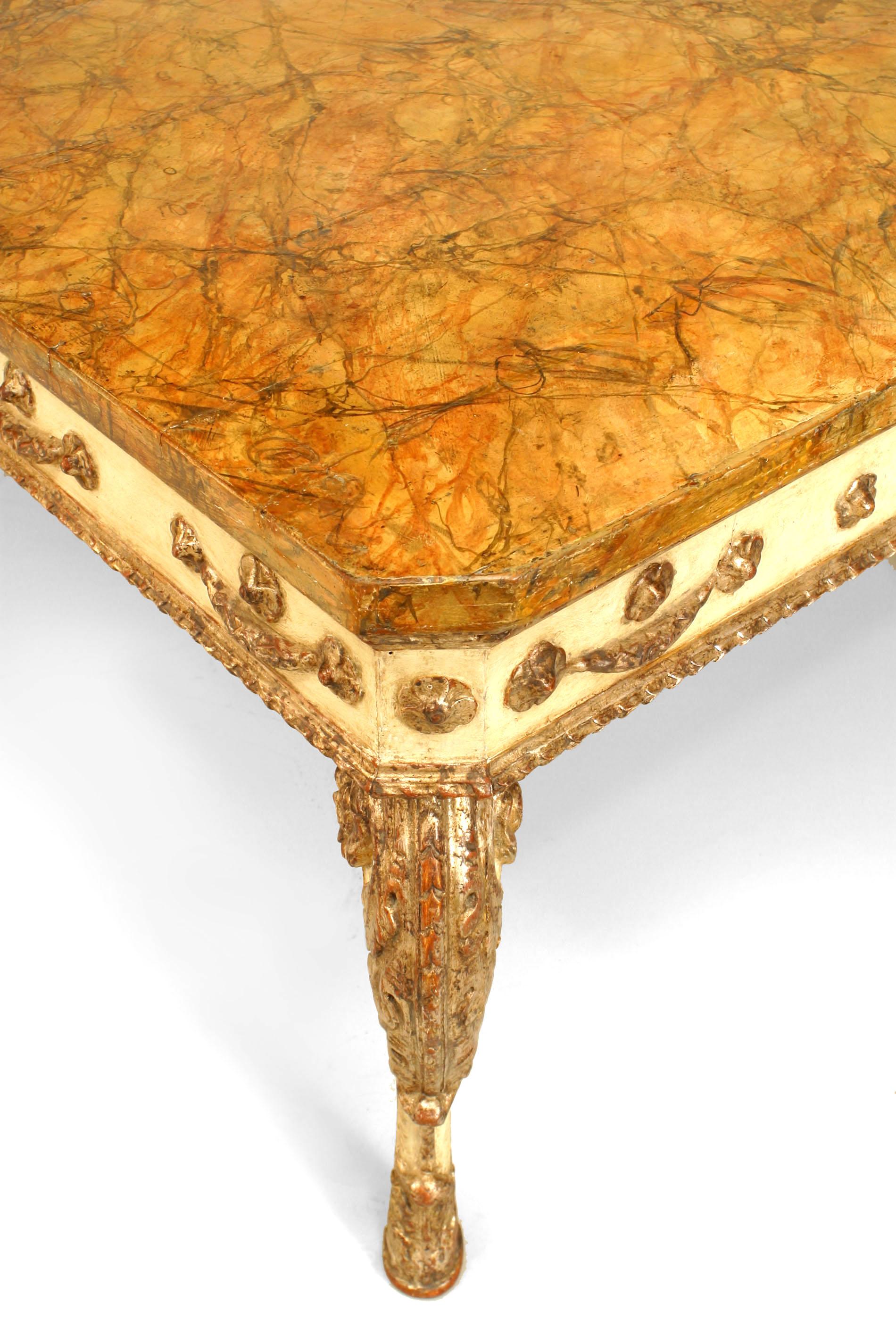 Italian Rococo style Sicilian (18th Century) large rectangular center table with a faux marble resting upon a white-painted & gilt carved base & apron supported on four cabriole legs.
