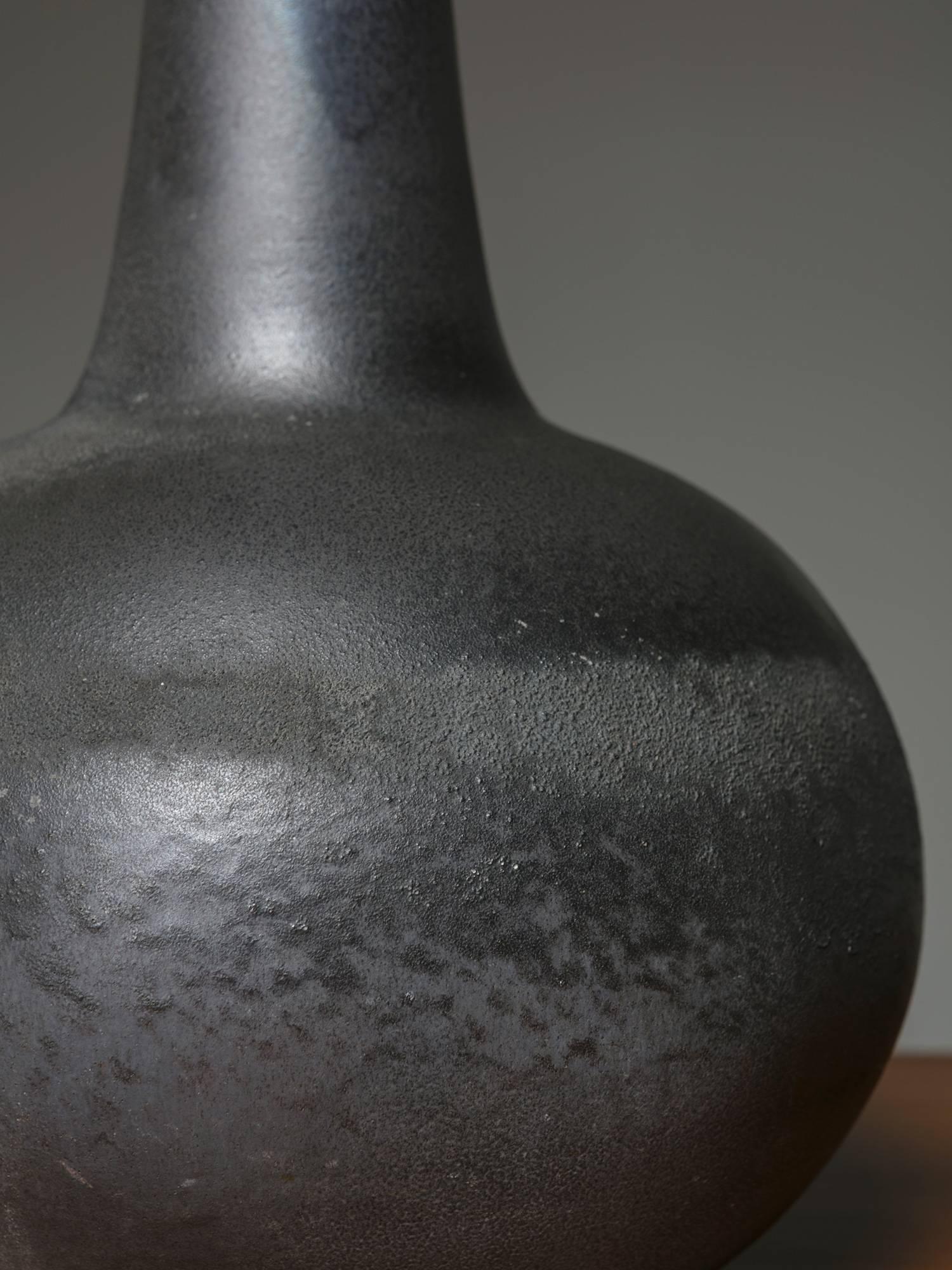 Remarkable ceramic vase with delicate surface finish.