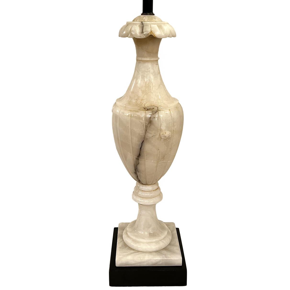 A single circa 1920's Italian carved alabaster table lamp.

Measurements:
Height of body: 29