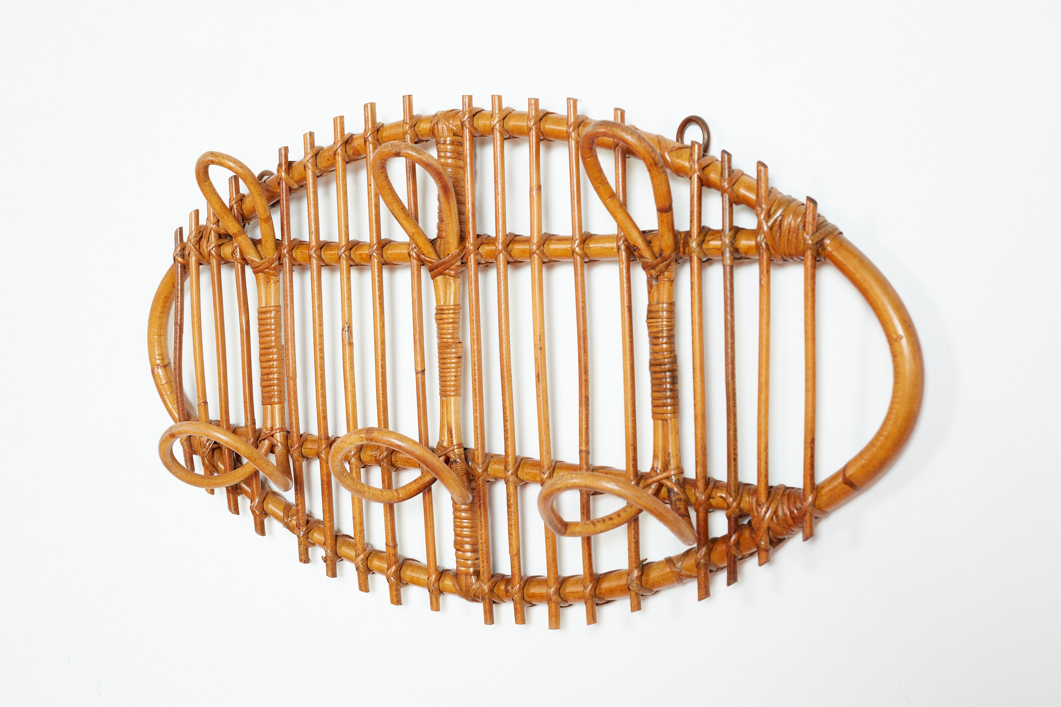 Large oval shaped Italian bamboo coatrack with oversized hooks.

Pair available - priced separately.

Italy, 1950s